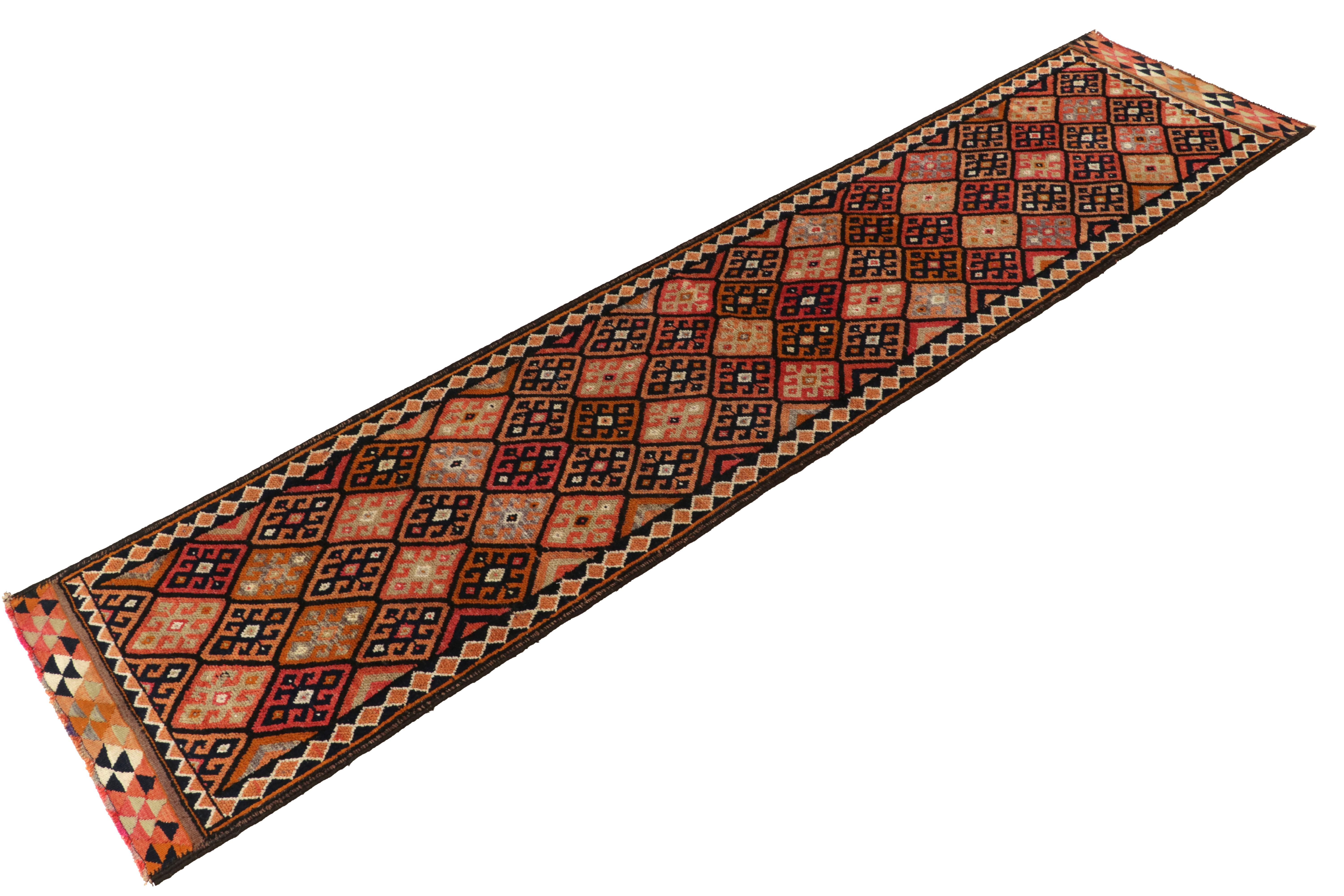 Turkish 1950s Vintage Tribal Runner in Orange, Red, Geometric Patterns by Rug & Kilim For Sale