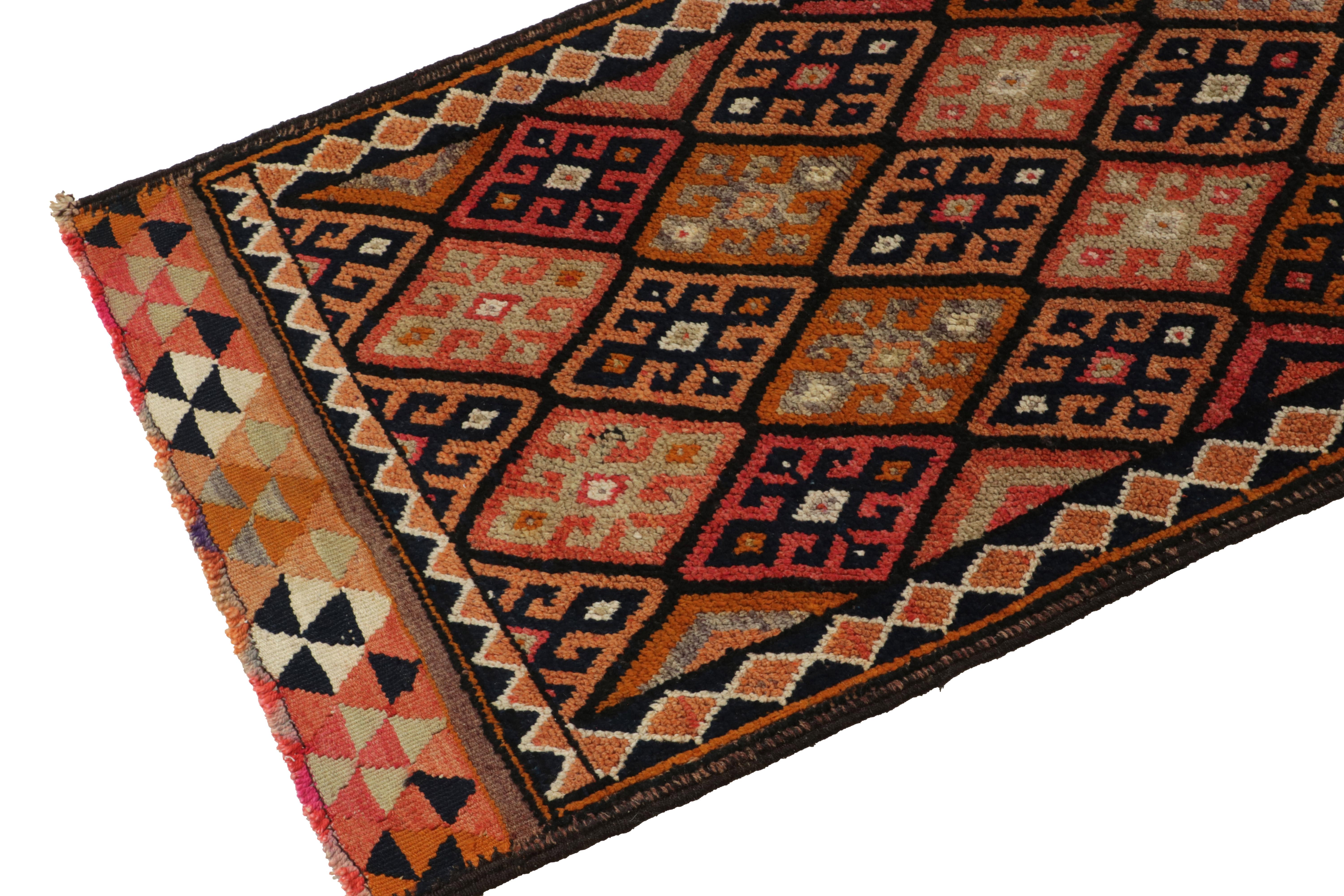 Hand-Knotted 1950s Vintage Tribal Runner in Orange, Red, Geometric Patterns by Rug & Kilim For Sale