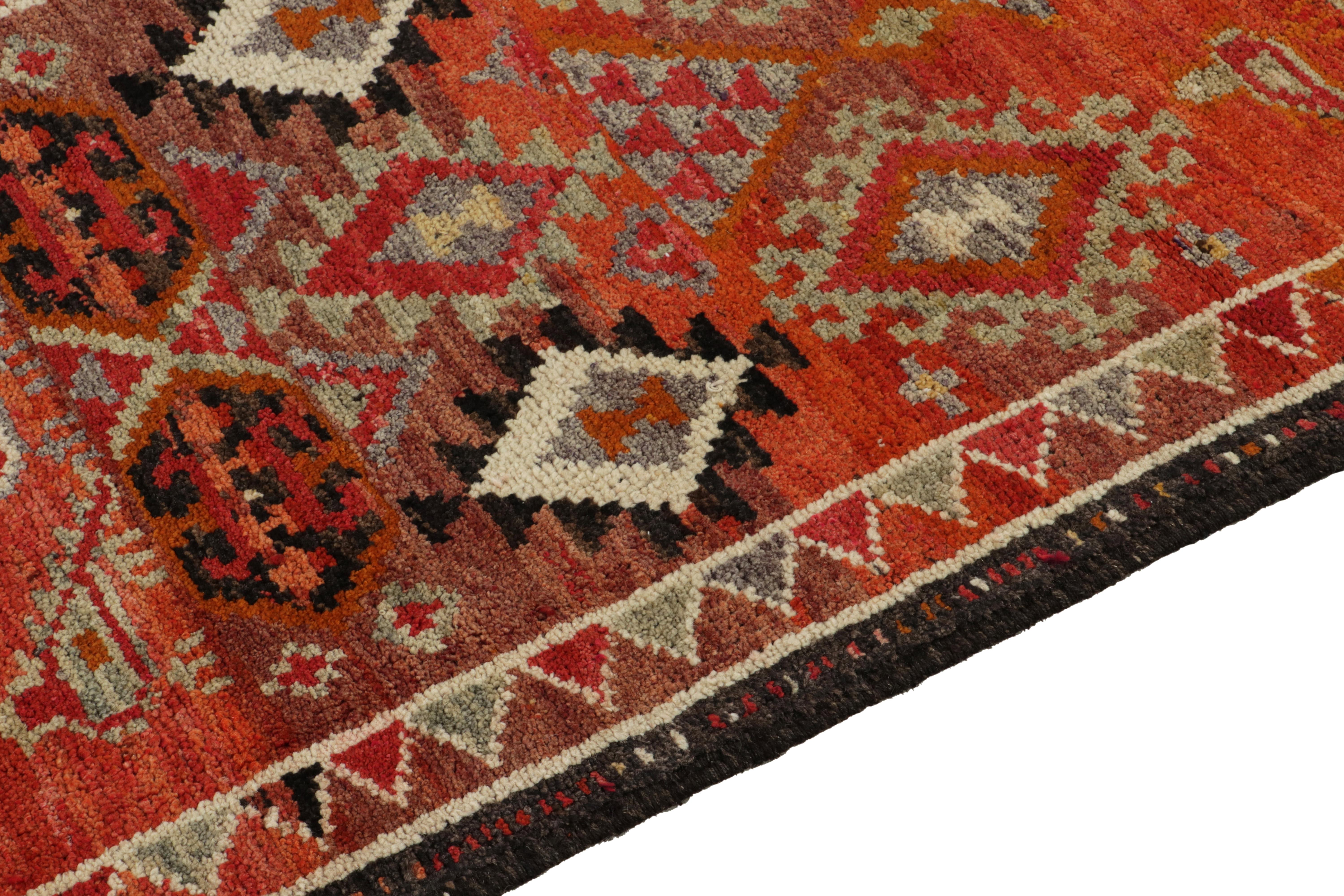 1950s Vintage Tribal Runner in Orange Red Multihued Tribal Motifs by Rug & Kilim In Good Condition For Sale In Long Island City, NY