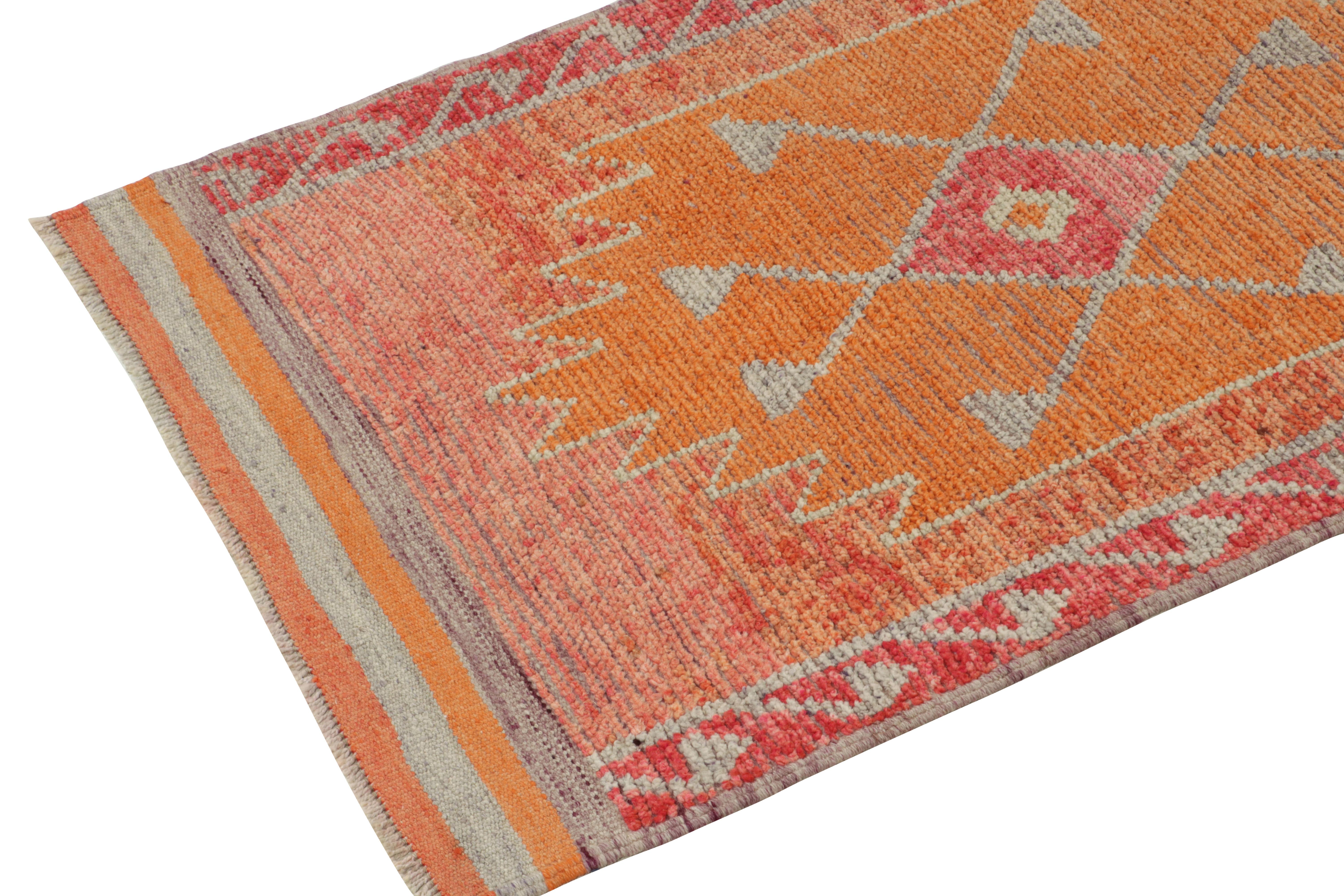Hand-Knotted 1950s Vintage Tribal runner in Pink, Red and Orange Medallion by Rug & Kilim For Sale