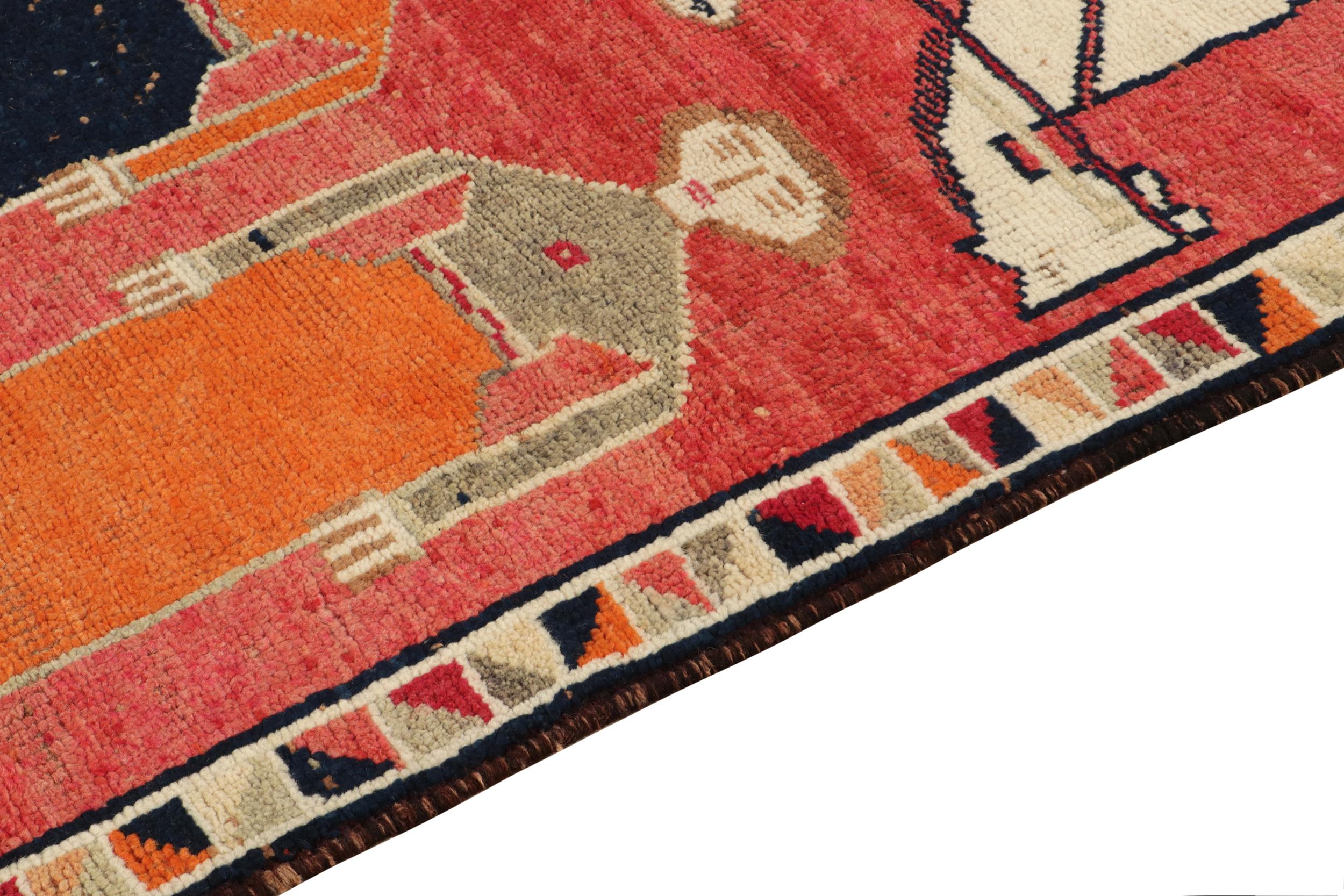 Hand-Knotted 1950s Vintage Tribal Runner in Red Background Multihued Pictorial by Rug & Kilim For Sale