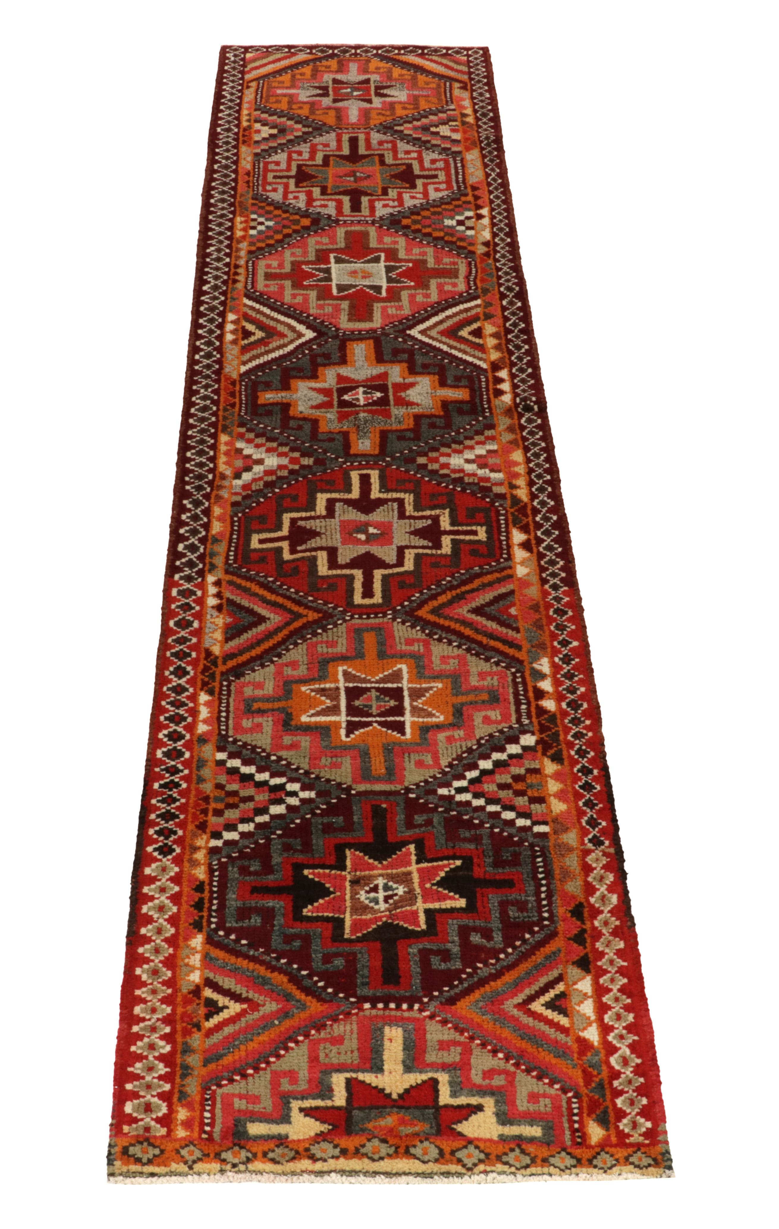 Turkish 1950s Vintage Tribal Runner in Red, Orange Geometric Patterns by Rug & Kilim For Sale