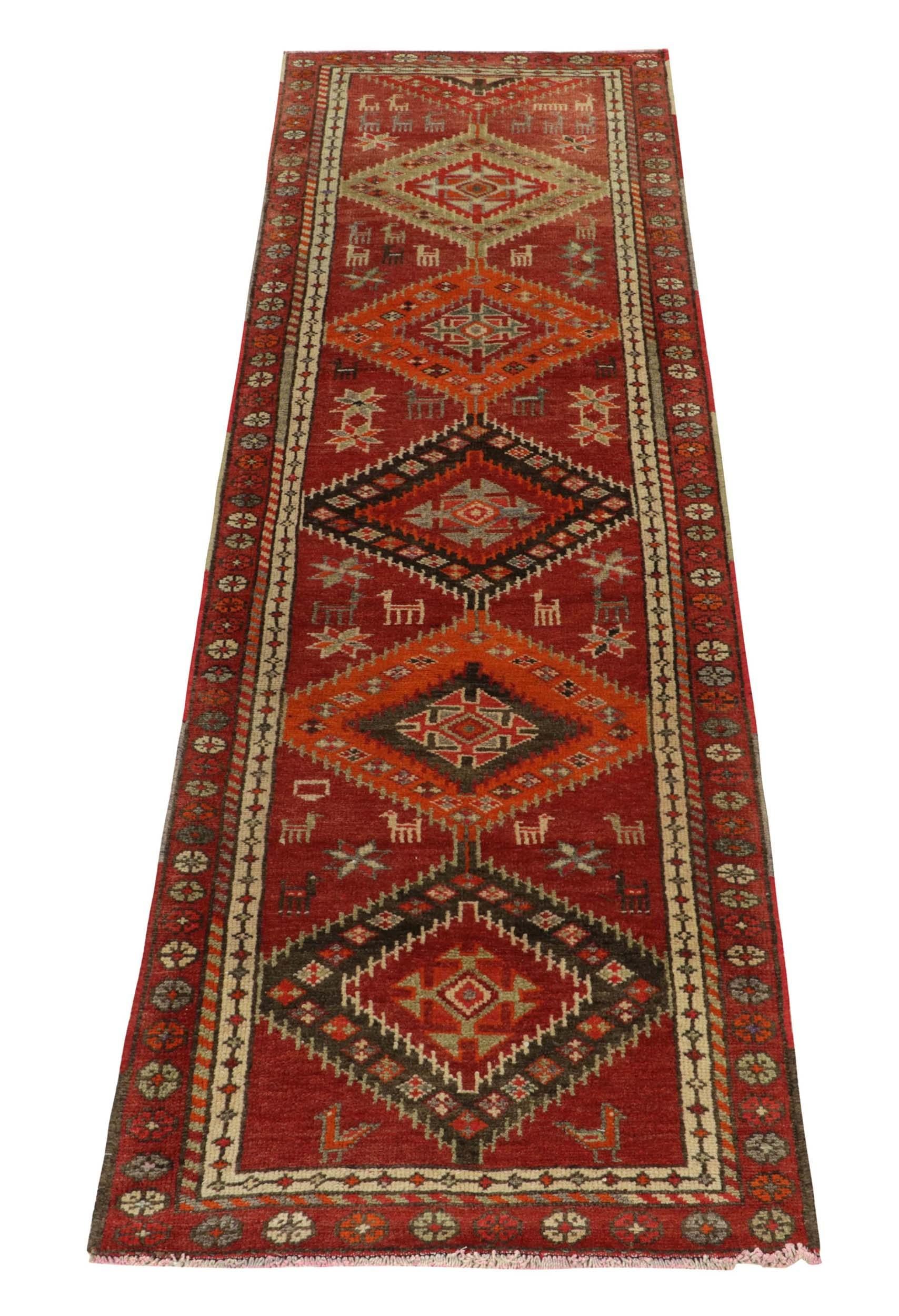 Hand-knotted in wool, a 3x10 runner from Rug & Kilim’s latest prominent curation of distinguished tribal pieces. 

Originating from Turkey circa 1950-1960, the drawing relishes a symmetric diamond pattern with traditional motifs & animal imagery