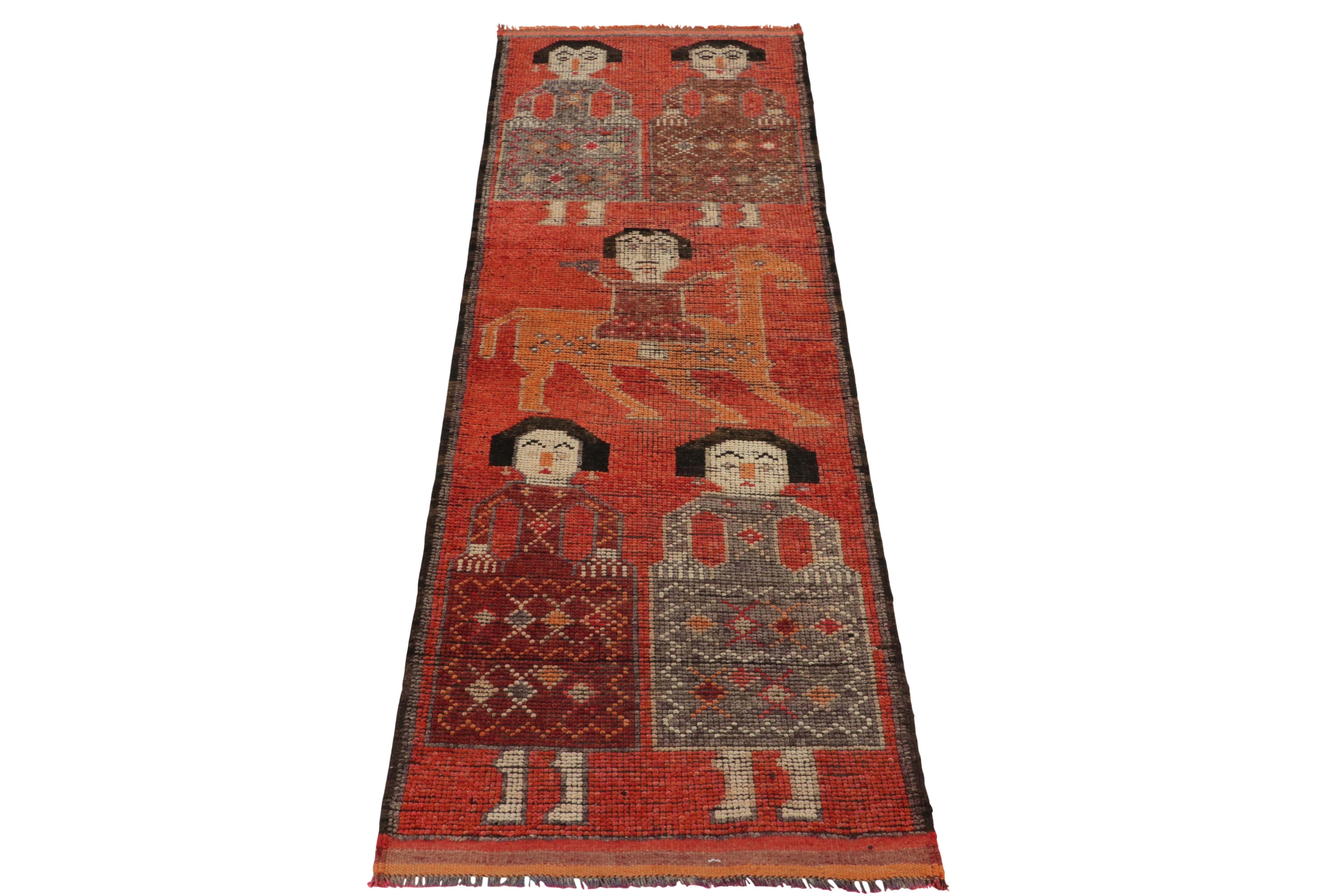 Hand-knotted in wool, a 3x13 vintage runner from Rug & Kilim’s latest curation of rare tribal pieces. Originating from Turkey circa 1950-1960, a graphic piece of culture as rich as it is collectible. 

The rug enjoys human & animal pictorials in
