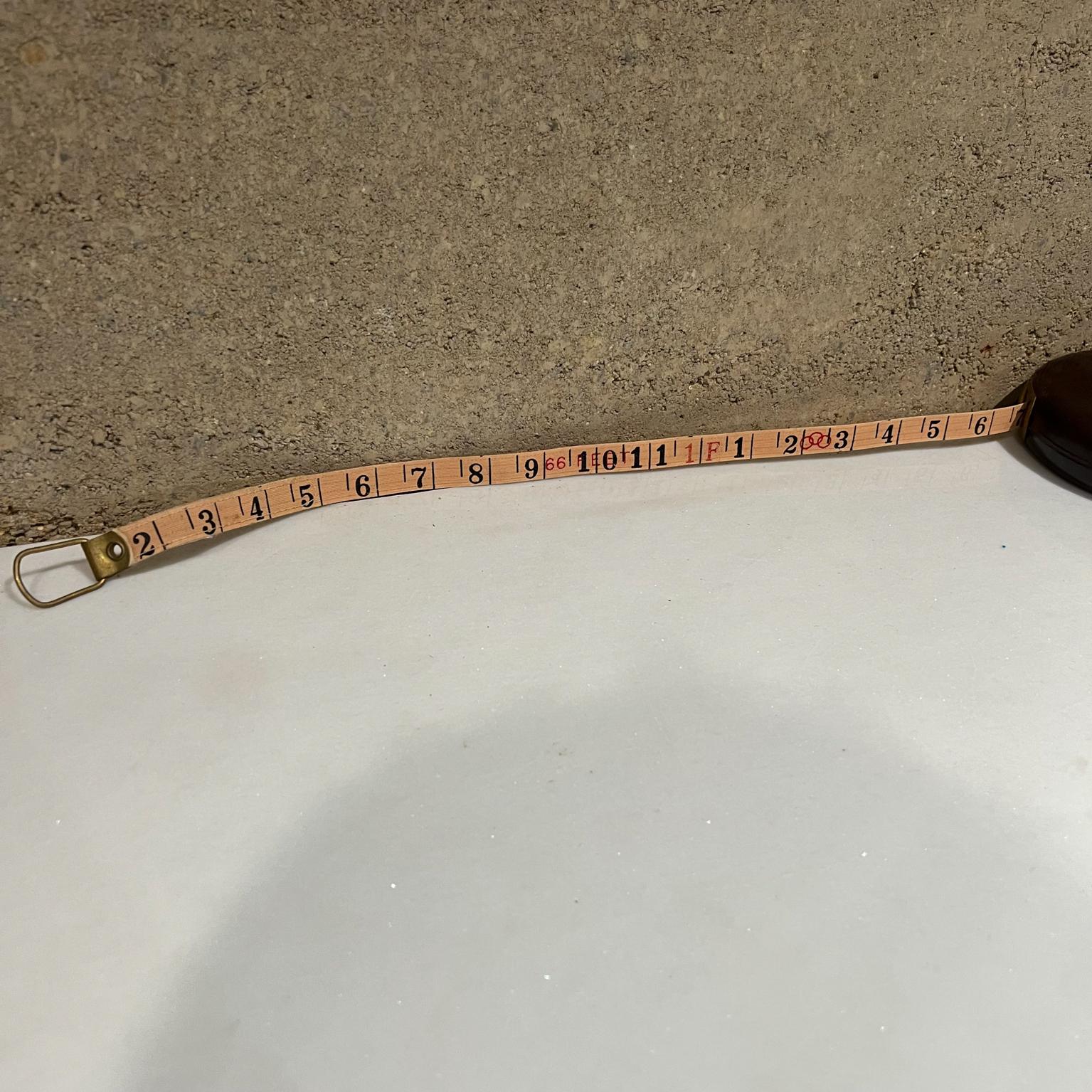 1950s Vintage Tricle Bakelite Olympic Tape Measure Peoples Republic of China In Good Condition For Sale In Chula Vista, CA