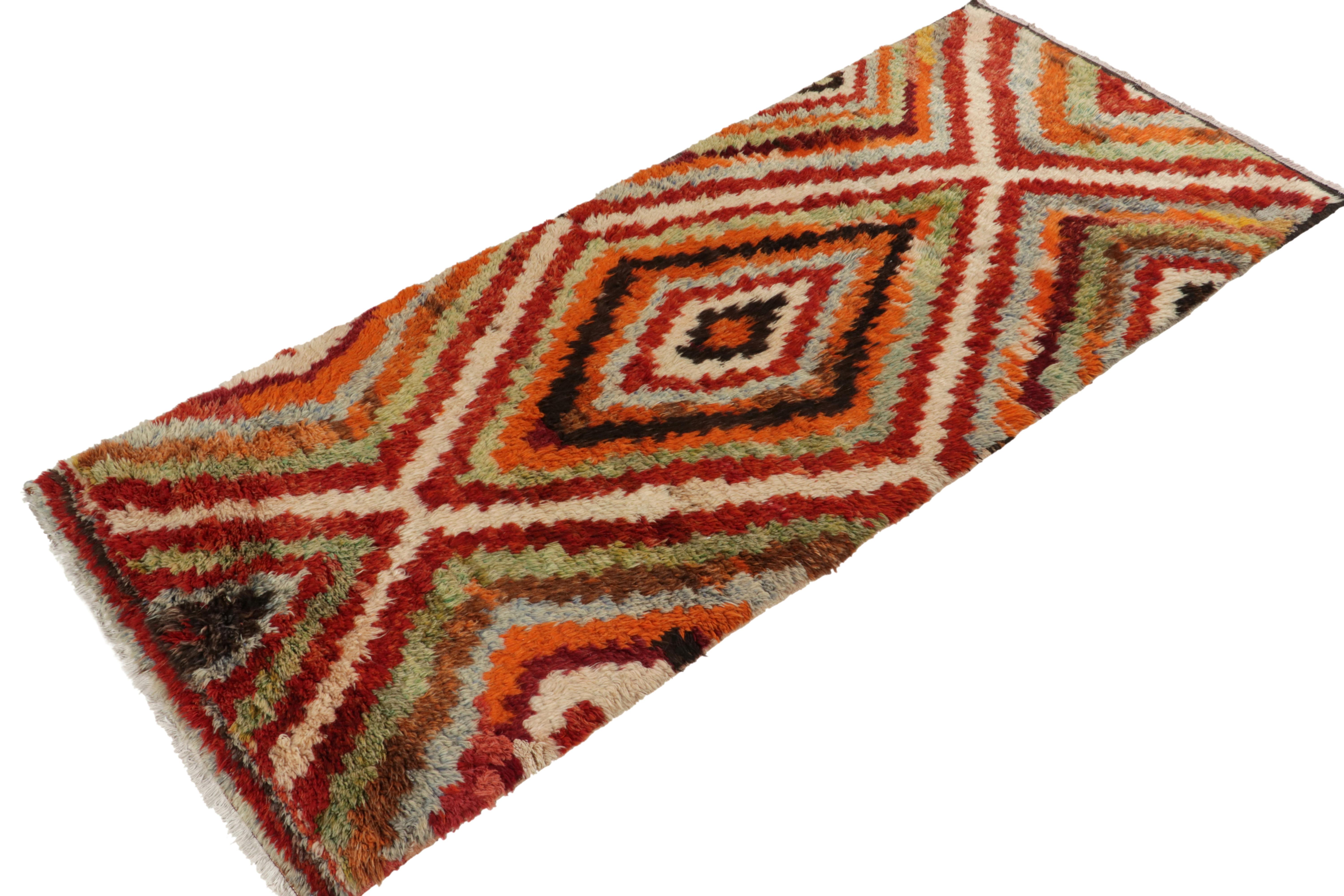 Tribal 1950s Vintage Tulu Rug in Orange, Red, Green Geometric Pattern by Rug & Kilim For Sale