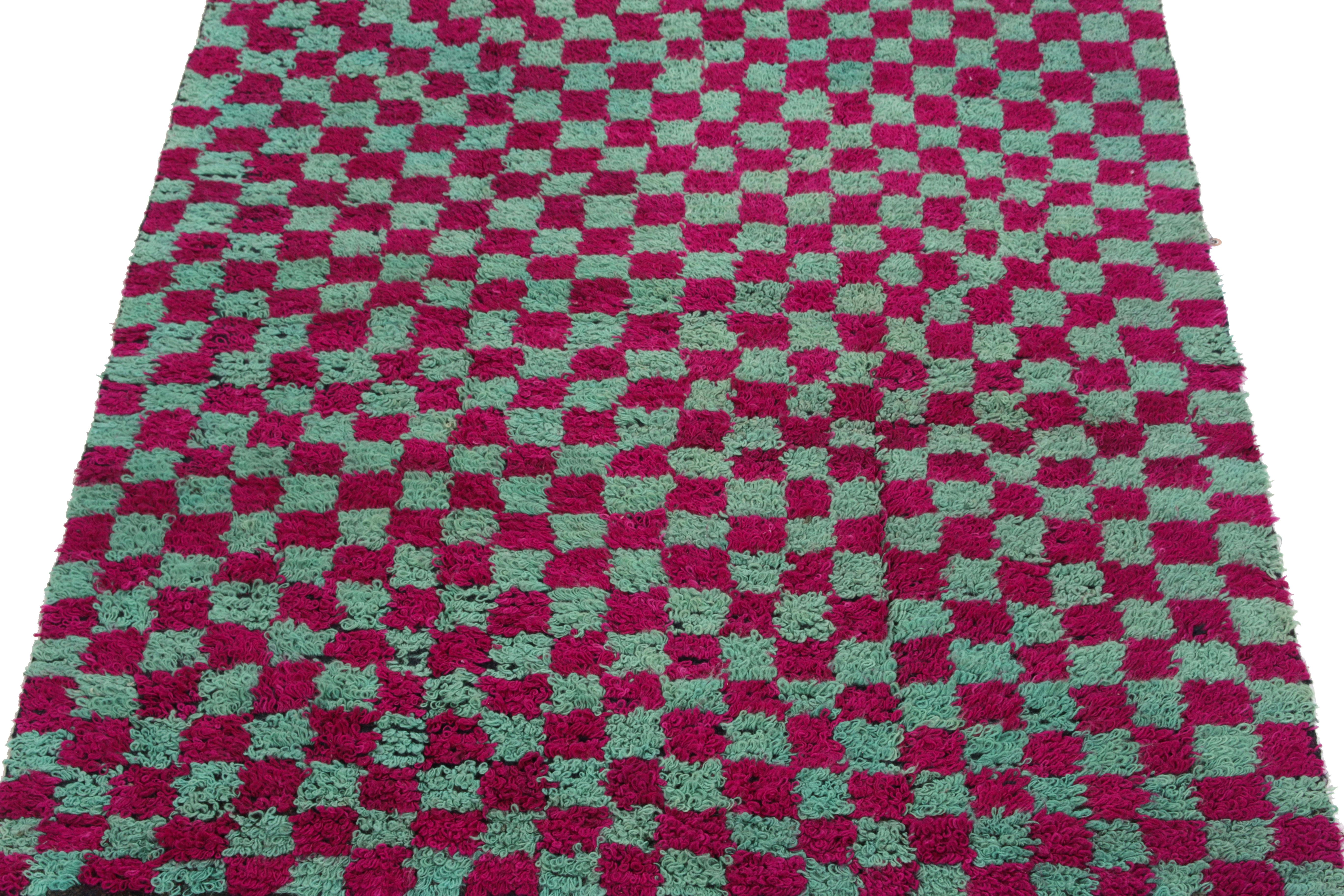 Hand-knotted in wool, a 4x5 vintage Tulu rug originating from Turkey circa 1950-1960, now joining Rug & Kilim’s Antique & Vintage collection. The healthy loop pile features a well defined checkered pattern in magenta & blue for delicious symmetry