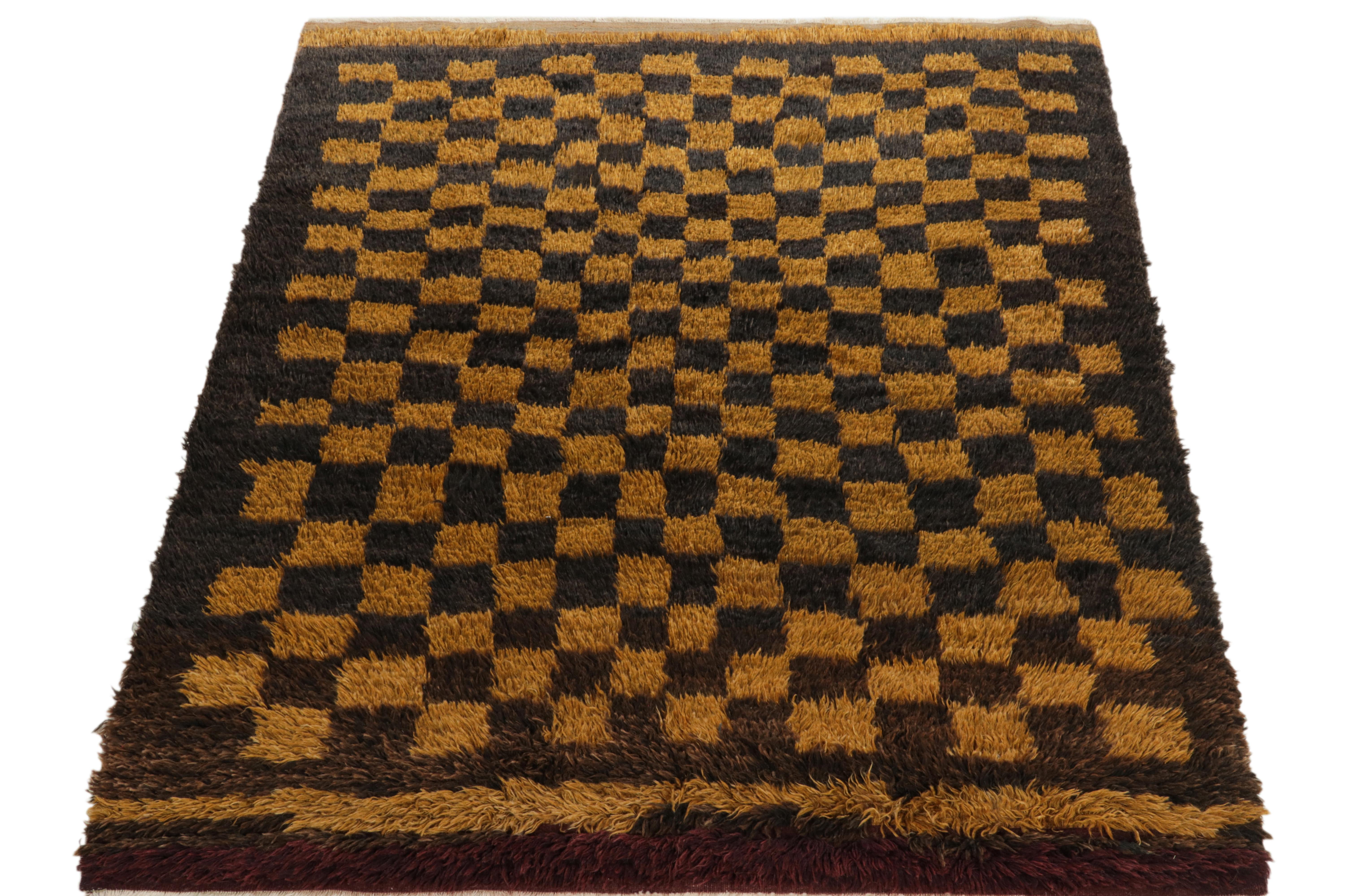 Hand-knotted in wool, a 5x6 vintage Tulu rug originating from Turkey circa 1950-1960, now joining Rug & Kilim’s Antique & Vintage collection. 

On the design: The healthy pile features a well defined checkered pattern in black & gold following