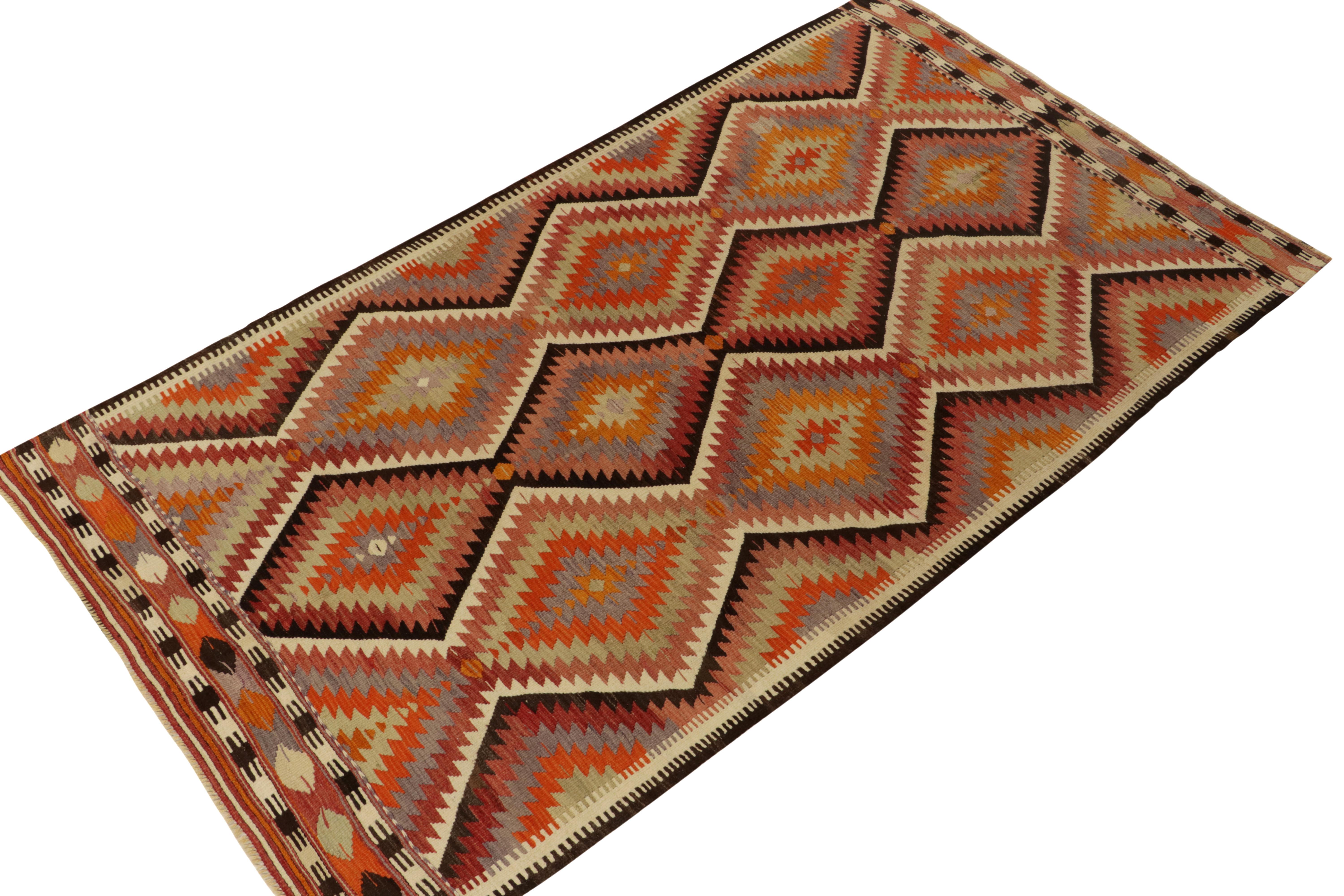 Hand-Woven 1950s Vintage Turkish Kilim rug in Green Orange Geometric Pattern