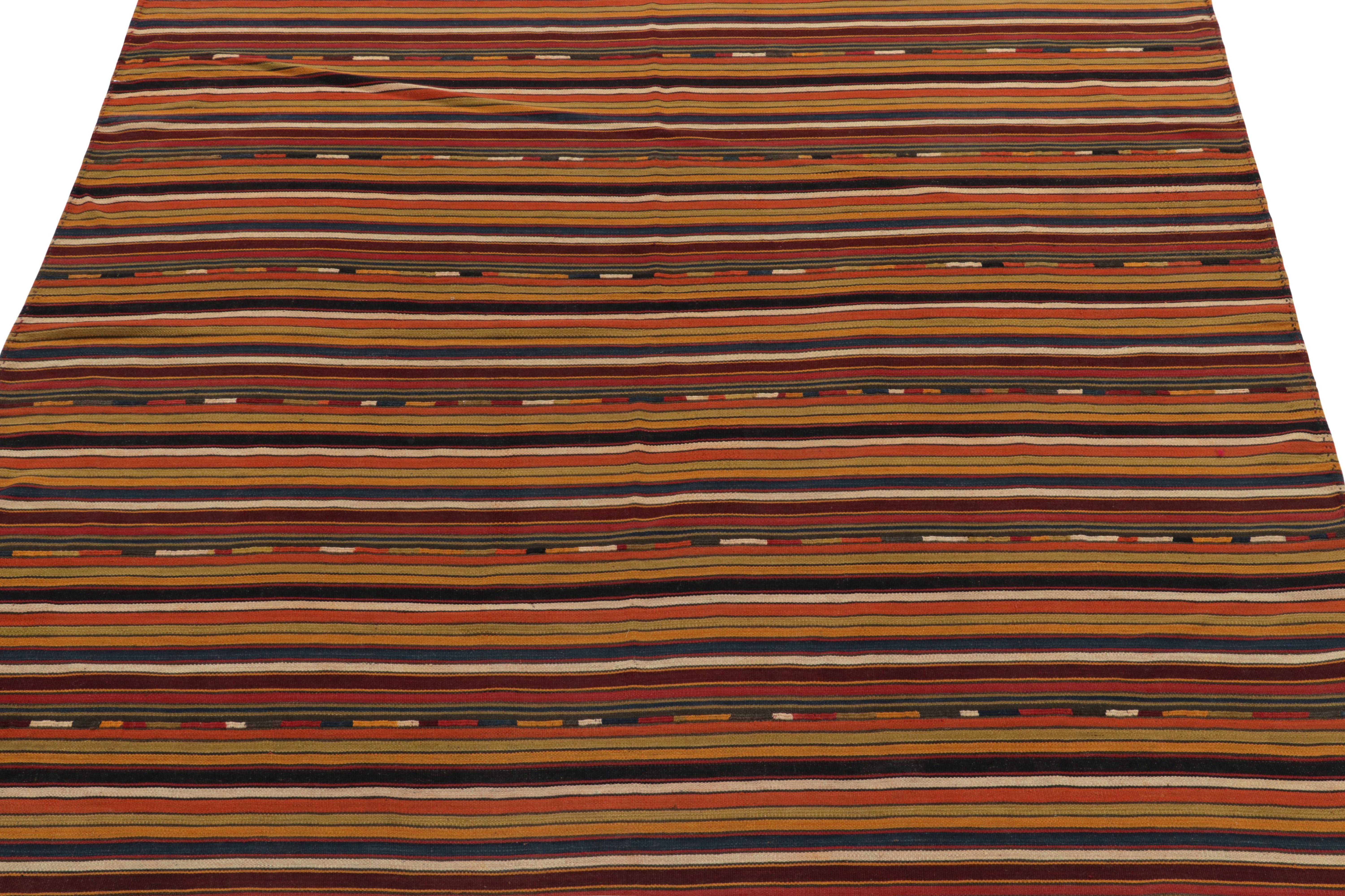 Originating from Turkey circa 1950-1960, a vintage kilim rug style now entering our classic flat weave selections. Characterized by fine detailing, the piece revels comfortably in warm brown, gold, green & red marking a less-common square flat weave