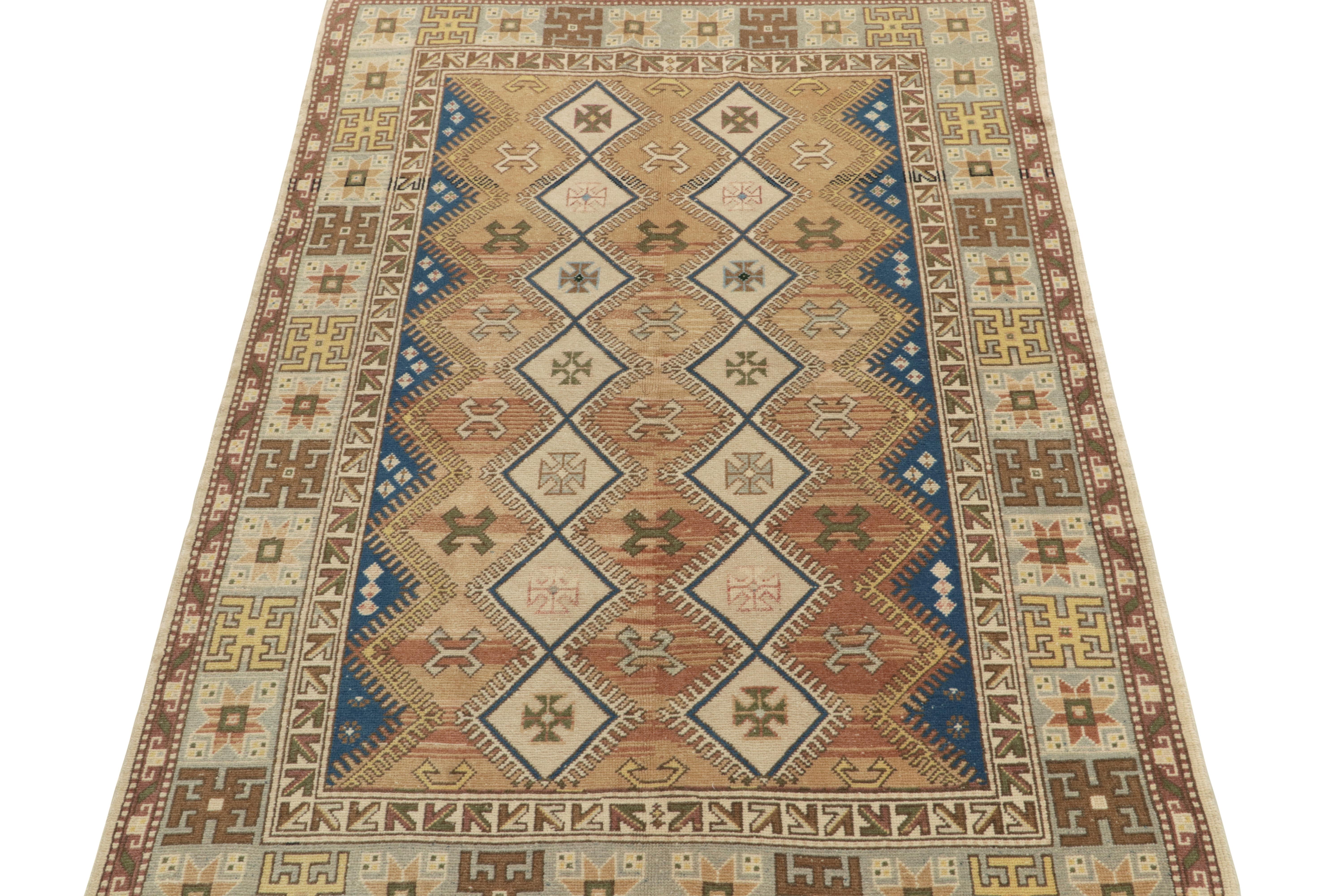 Originating from Turkey circa 1950-1960, a mid-century tribal rug now entering our Antique & Vintage selections. Characterized by fine detailing, the piece revels comfortably in bright blue, gold & beige marking a less-common approach to tribal