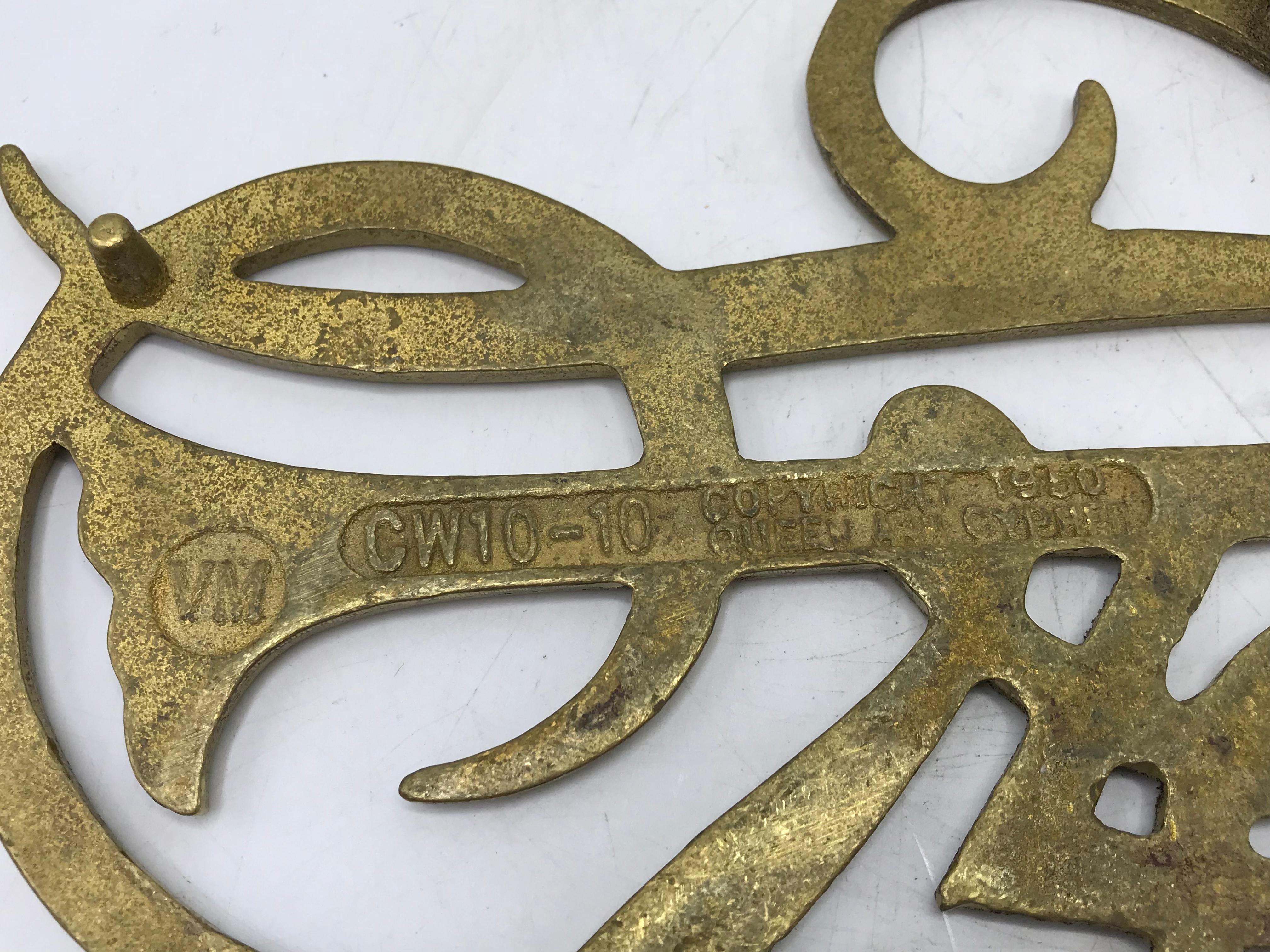 20th Century 1950s Virginia Metalcrafters Brass Queen Ann Cypher Williamsburg Trivet For Sale