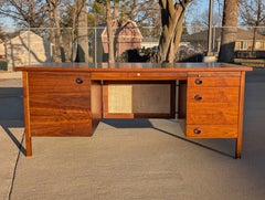 1950s Walnut and cane executive desk by Edward Wormley for Dunbar Furniture
