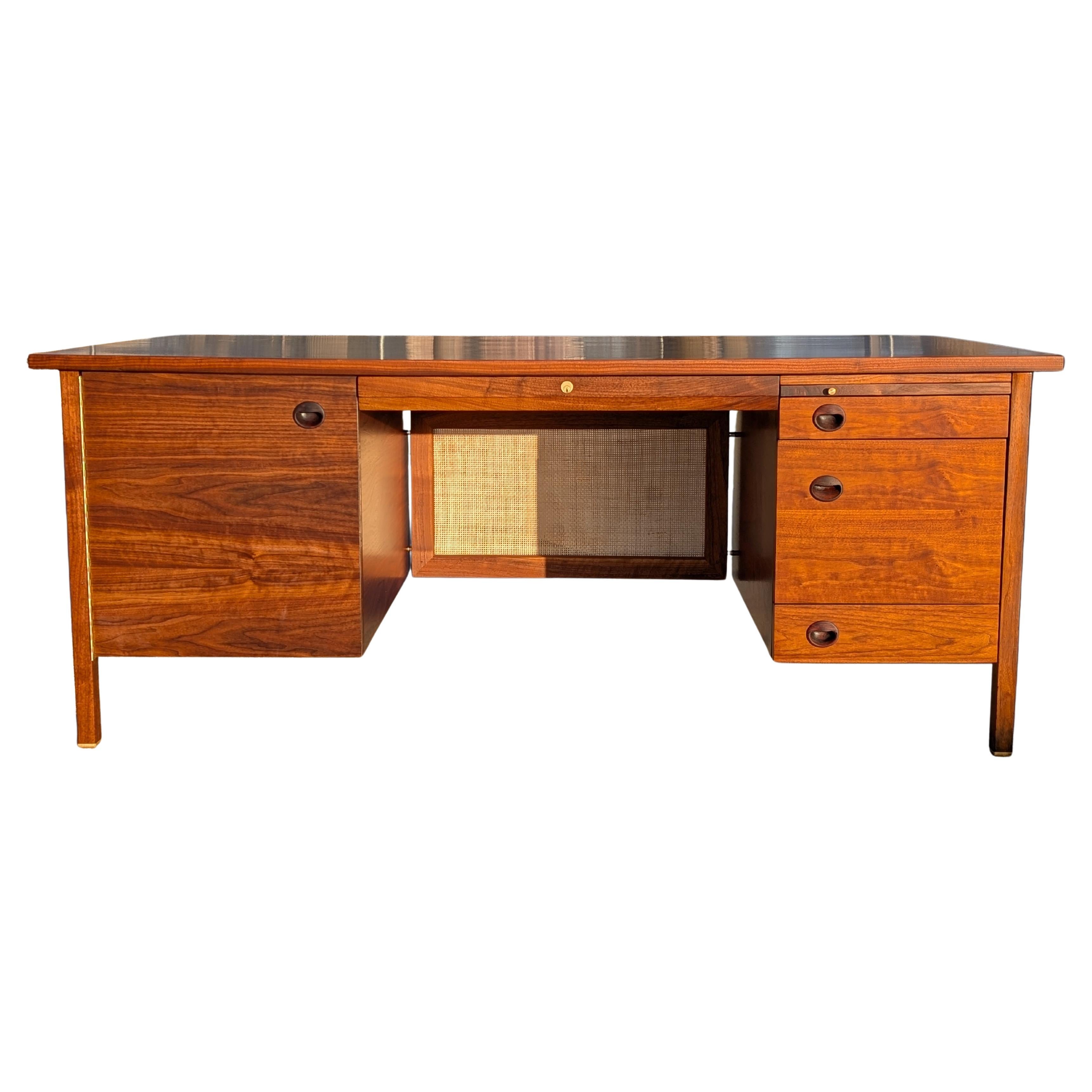 1950s Walnut and cane executive desk by Edward Wormley for Dunbar Furniture