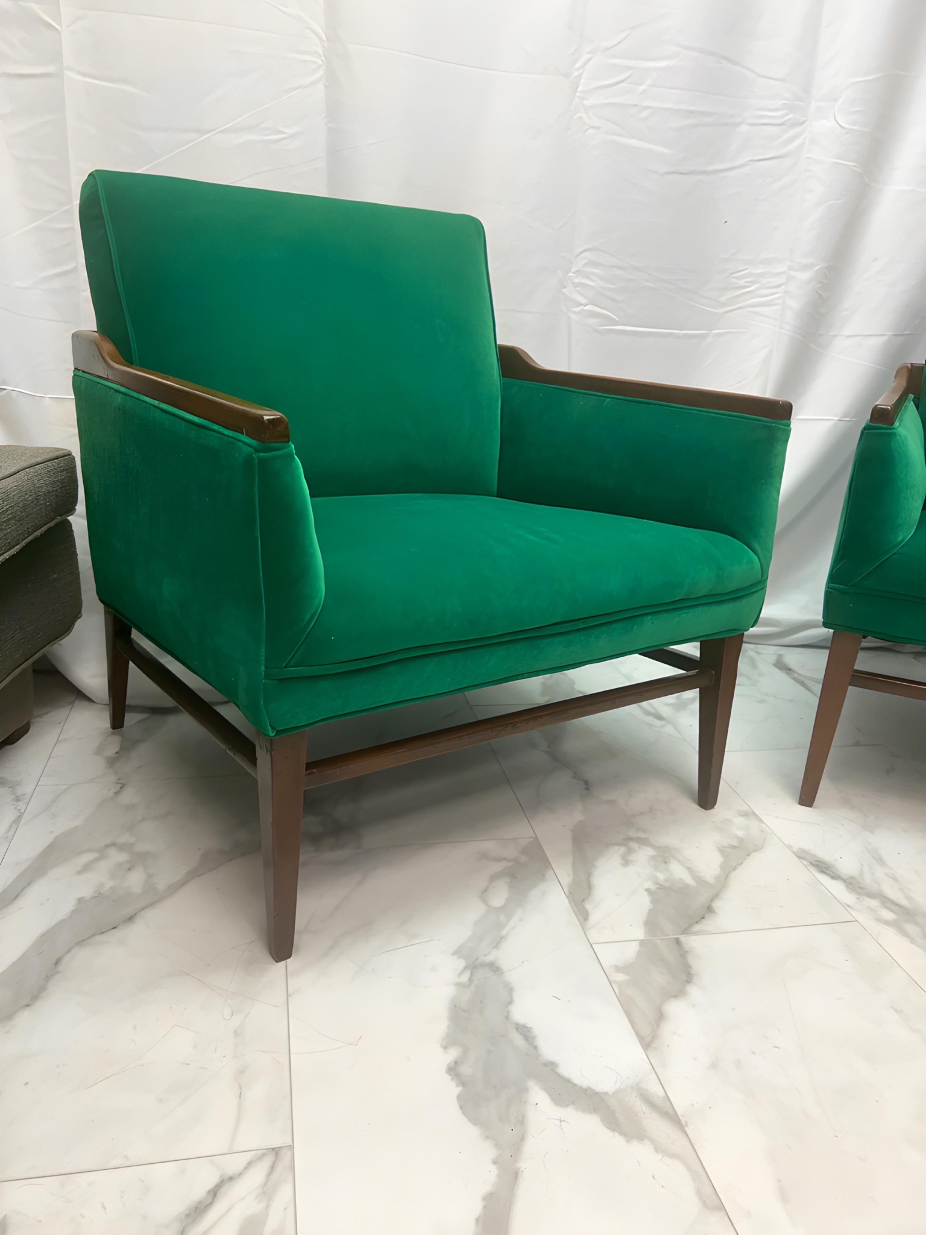 These fabulous chairs have been previously reupholstered in a  Kelly green performance velvet.  The chair’s arms and the top of the back are accentuated with walnut and have a walnut stretcher across the front 2 legs and on the legs going front to