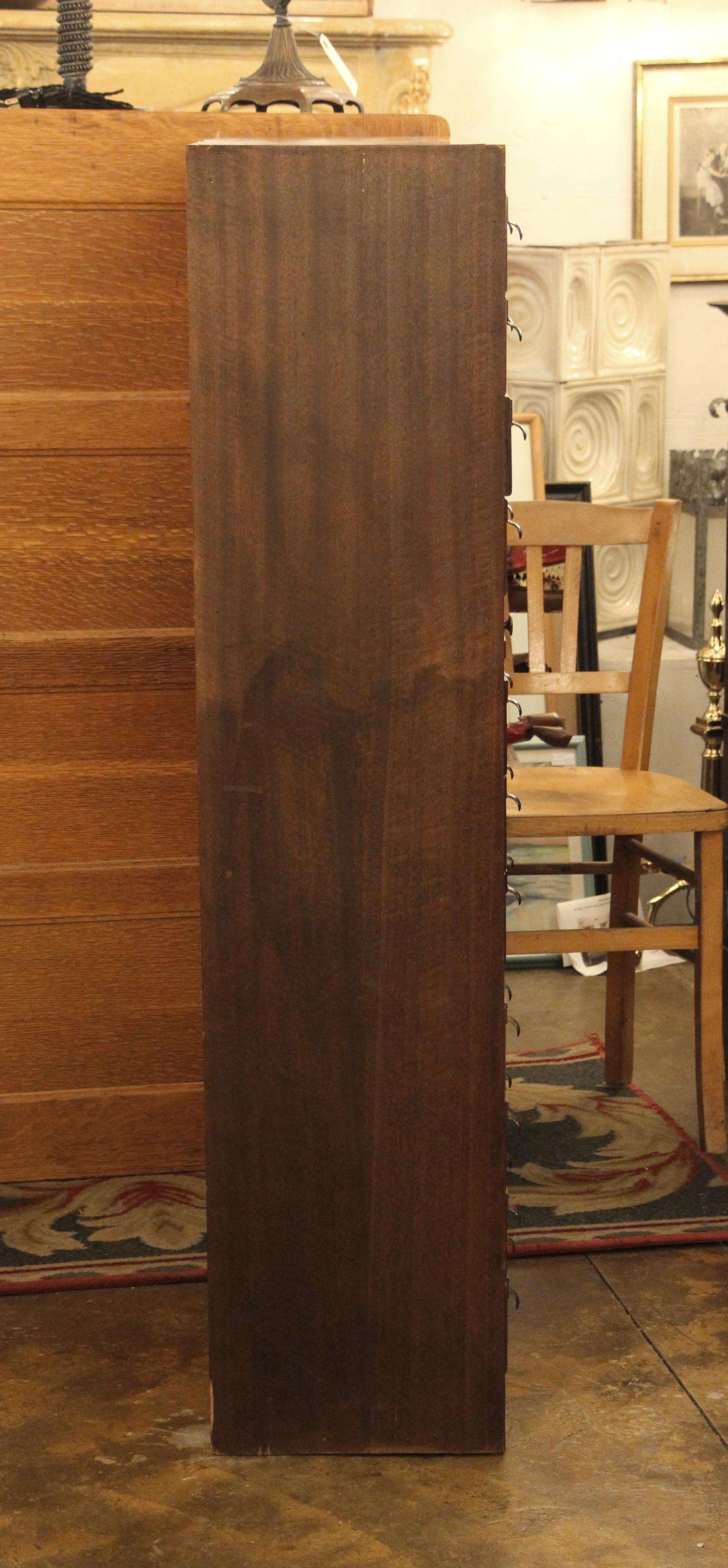 Industrial 1950s Walnut Card Catalog with Trays and Brass Hardware in a Dark Wood Tone