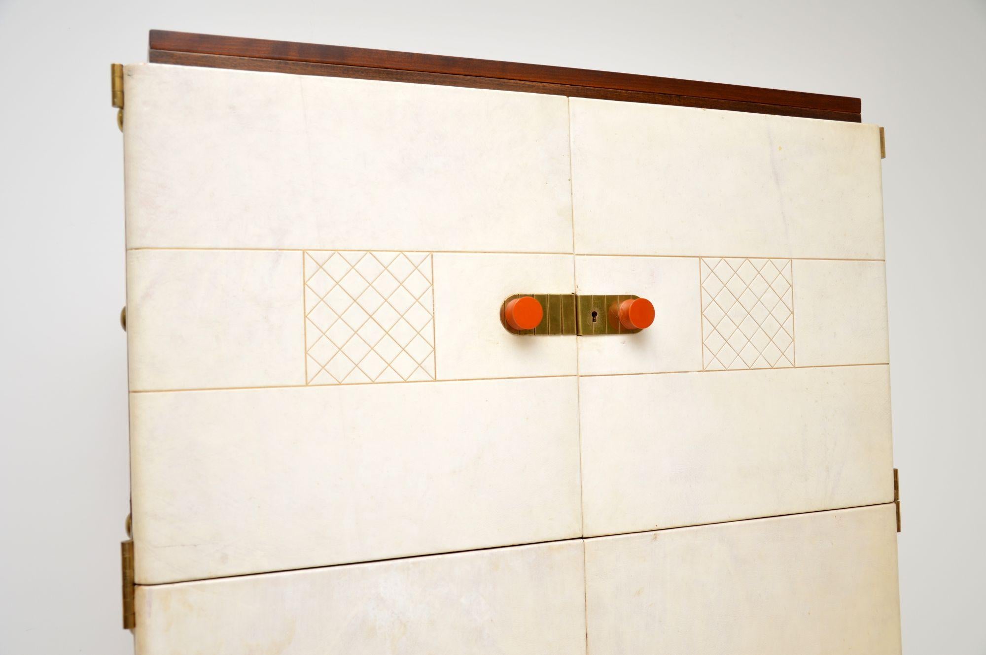 English 1950's Walnut & Leather Drinks Cabinet by Laszlo Hoenig