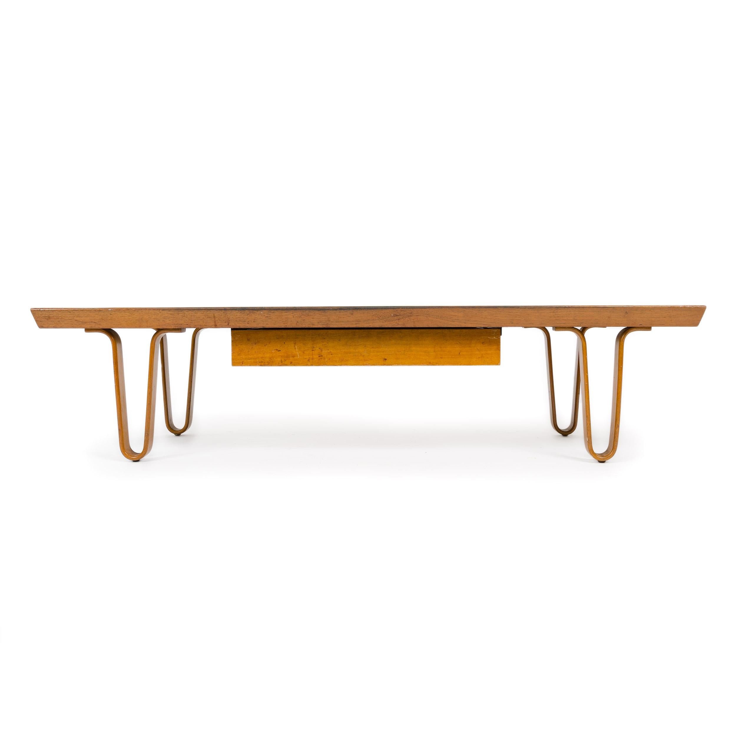A Classic 'Long John Bench' in walnut with drawer and laminated solid wood hairpin legs.