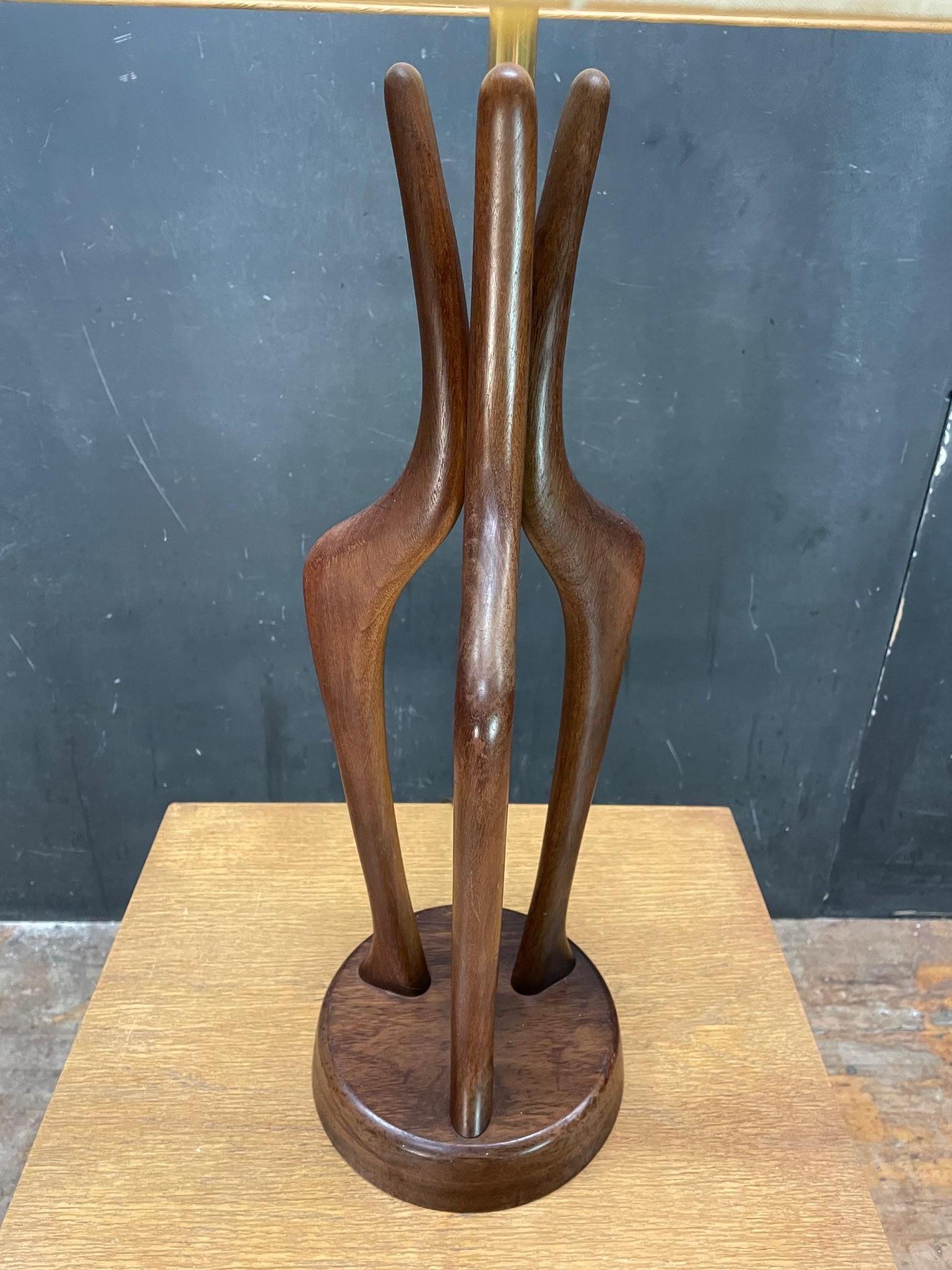 Made in USA, c.1940s-1960s. Possibly made by Modeline. No makers markings.  This is a working light, all connections tight, cord good. Solid Walnut spires, and turned staved walnut base.  Some light scuffs, stains, and scratches to wood surfaces. 