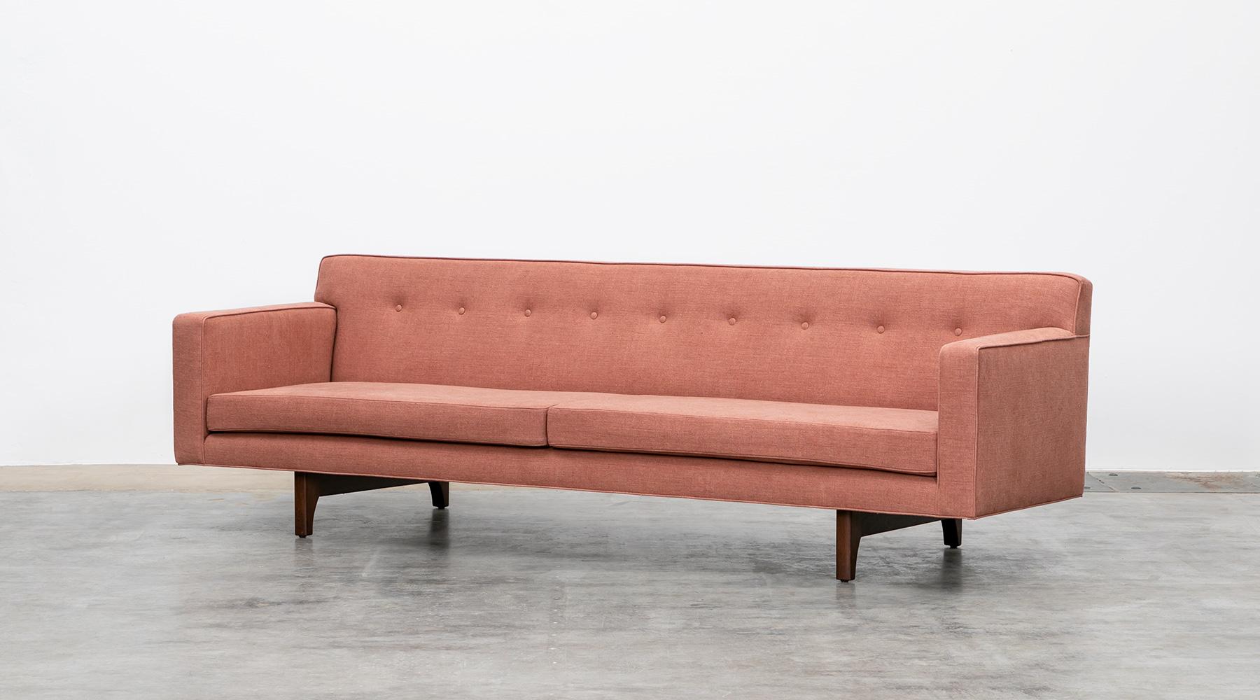 Three-seater sofa, new upholstery, wooden legs, Edward Wormley, USA, 1955.

Impressively simple sofa designed by Edward Wormley. Manufactured by Dunbar. The clear-shaped, stunning and outlasting design makes this sofa a particularly unique piece -