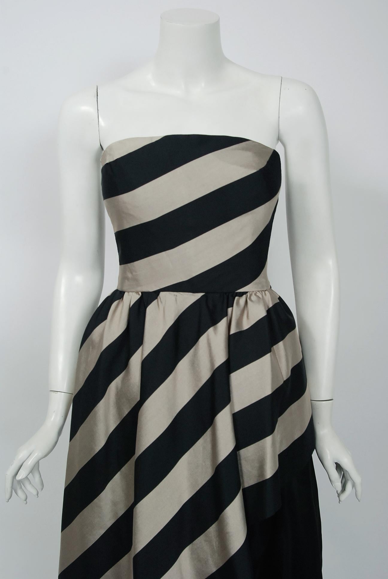 An amazing and highly stylized 1950's striped silk evening gown ensemble by Werle of Beverly Hills. Daniel Werle designed clothing for many Hollywood stars including Barbara Stanwyck, Marlo Thomas, Gloria Swanson and, most notably, many of the