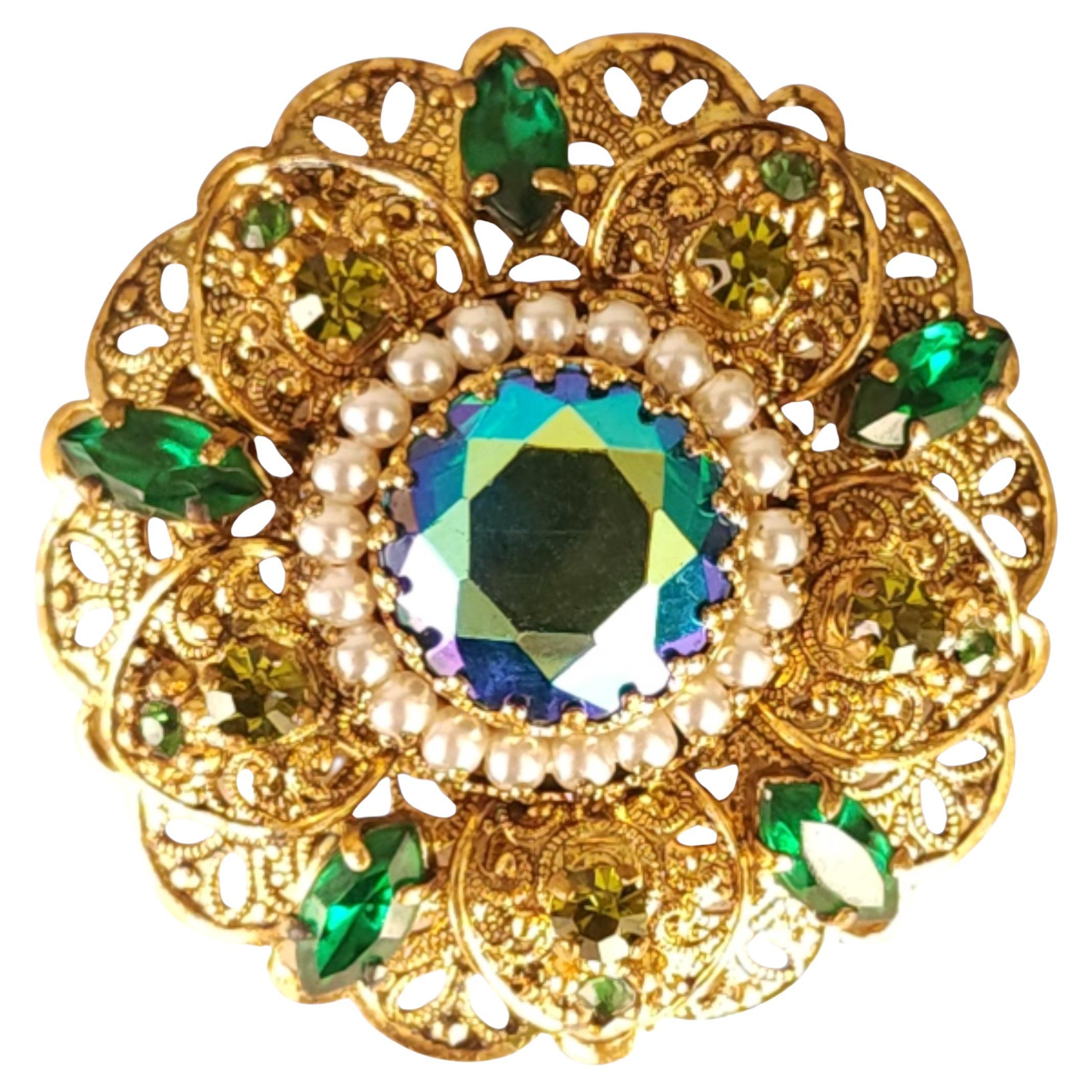 1950s Western Germany Gold-Tone Filigree Brooch with Green Rhinestones and Faux