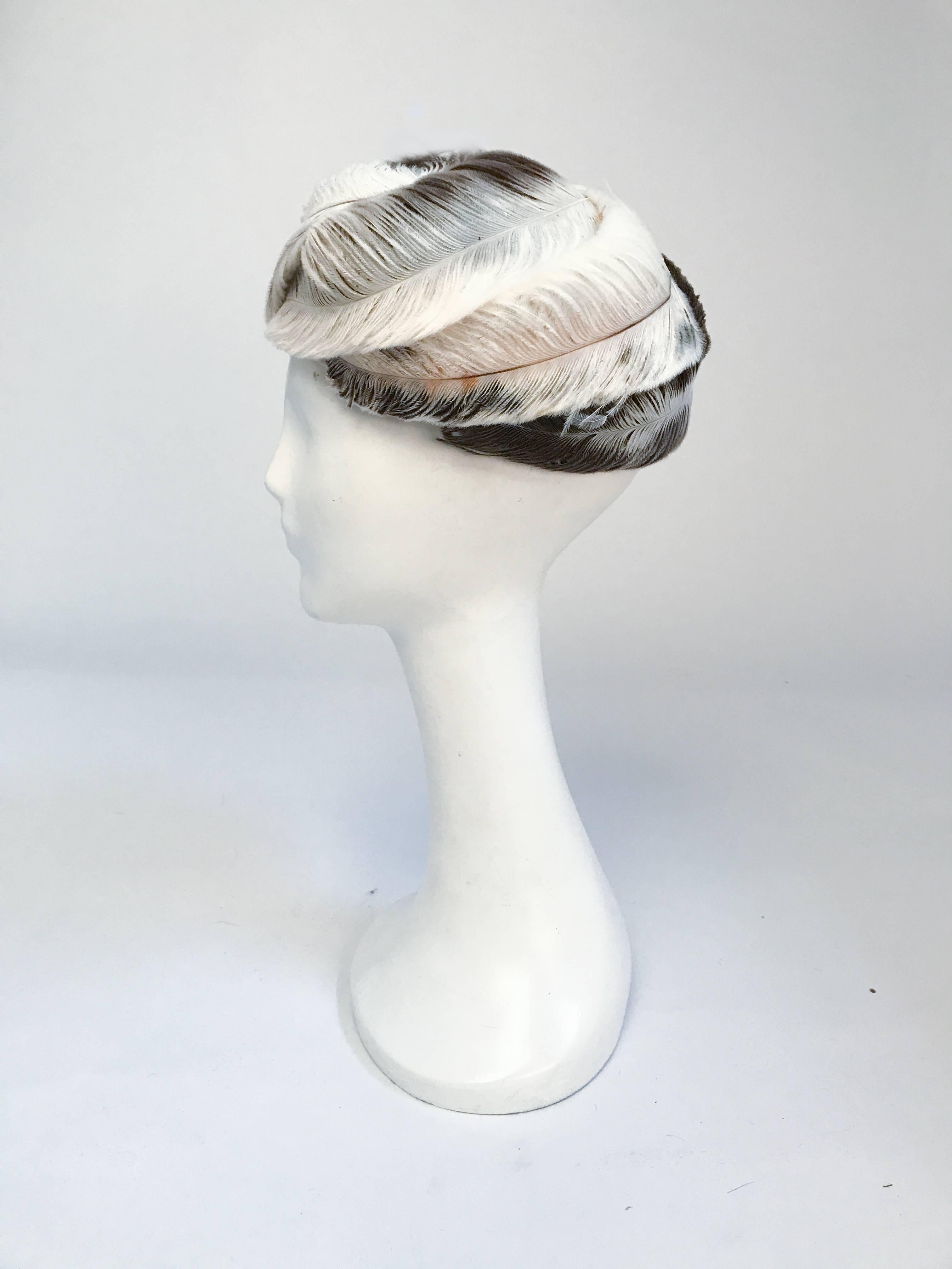 white feather hat