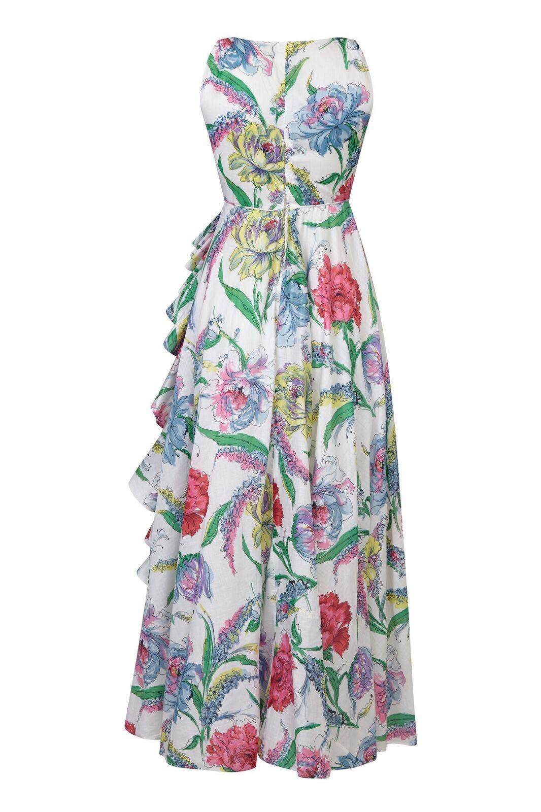 This sensational 1950s white cotton organza gown with floral print overlay is of exceptional quality and is beautifully constructed to showcase a classic hourglass figure. The floral overlay hosts a vibrant abstracted floral print in deep pinks,