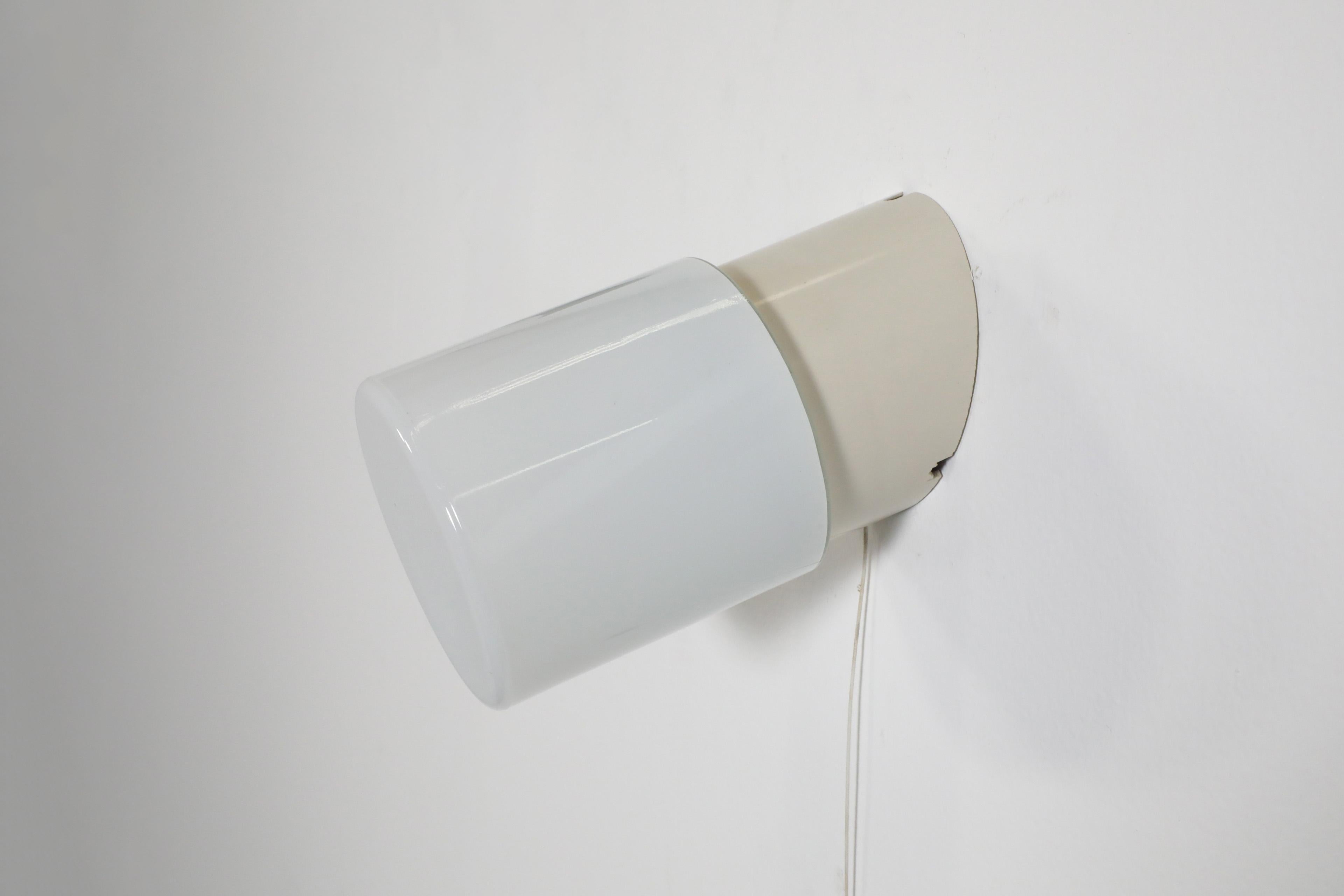 Milk Glass 1950's White Cylindrical Wall Sconce with Cream Bakelite Base and Pull Switch For Sale