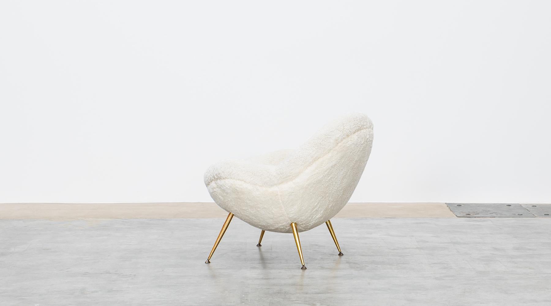 white faux fur chair