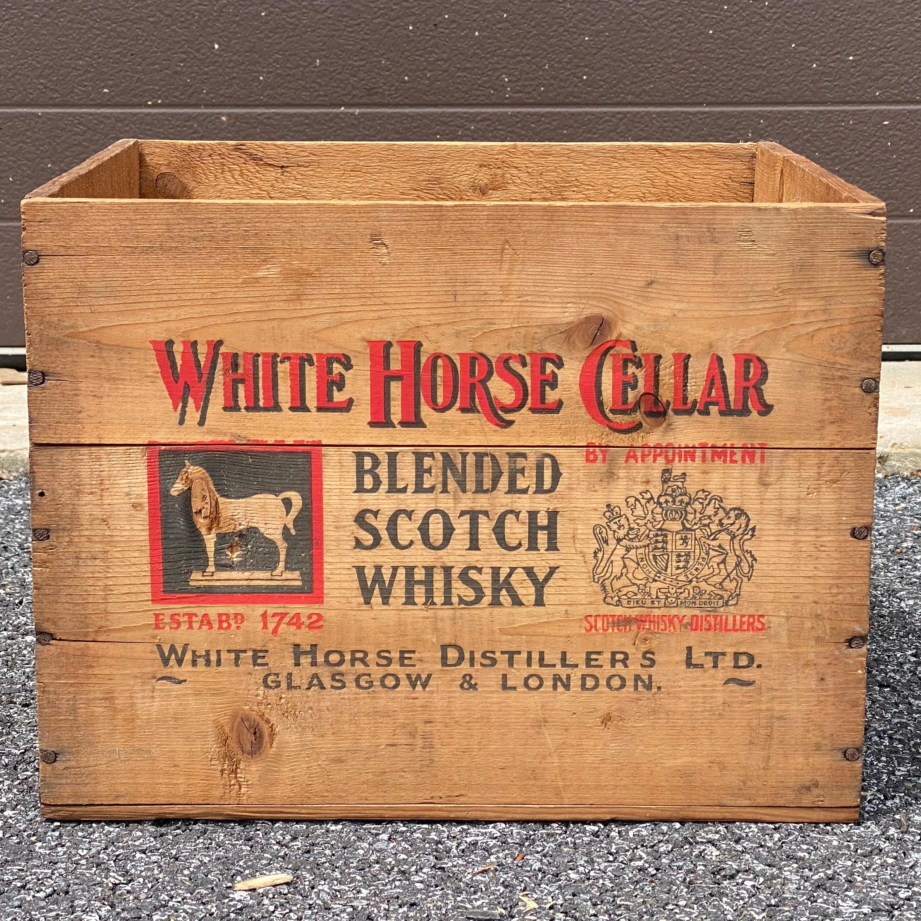 A nice vintage White Horse Cellar Scotch Whiskey wooden crate circa 1956

Interior dimensions roughly
14”x12.25”x 11”h