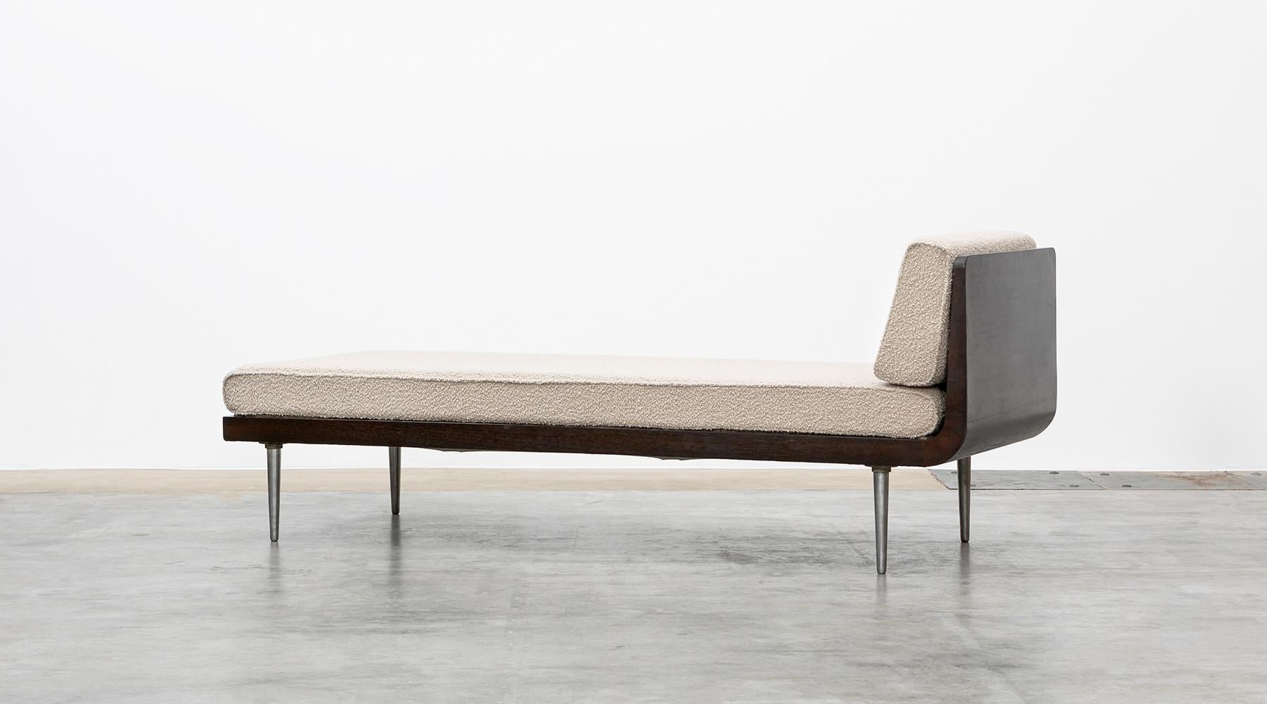 Daybed, new upholstery, wooden base, metal legs, Edward Wormley, USA, 1952.

Impressively simple daybed designed by famous Edward Wormley. The base is a wooden construction and stands on metal legs. The lying surface and back cushions are