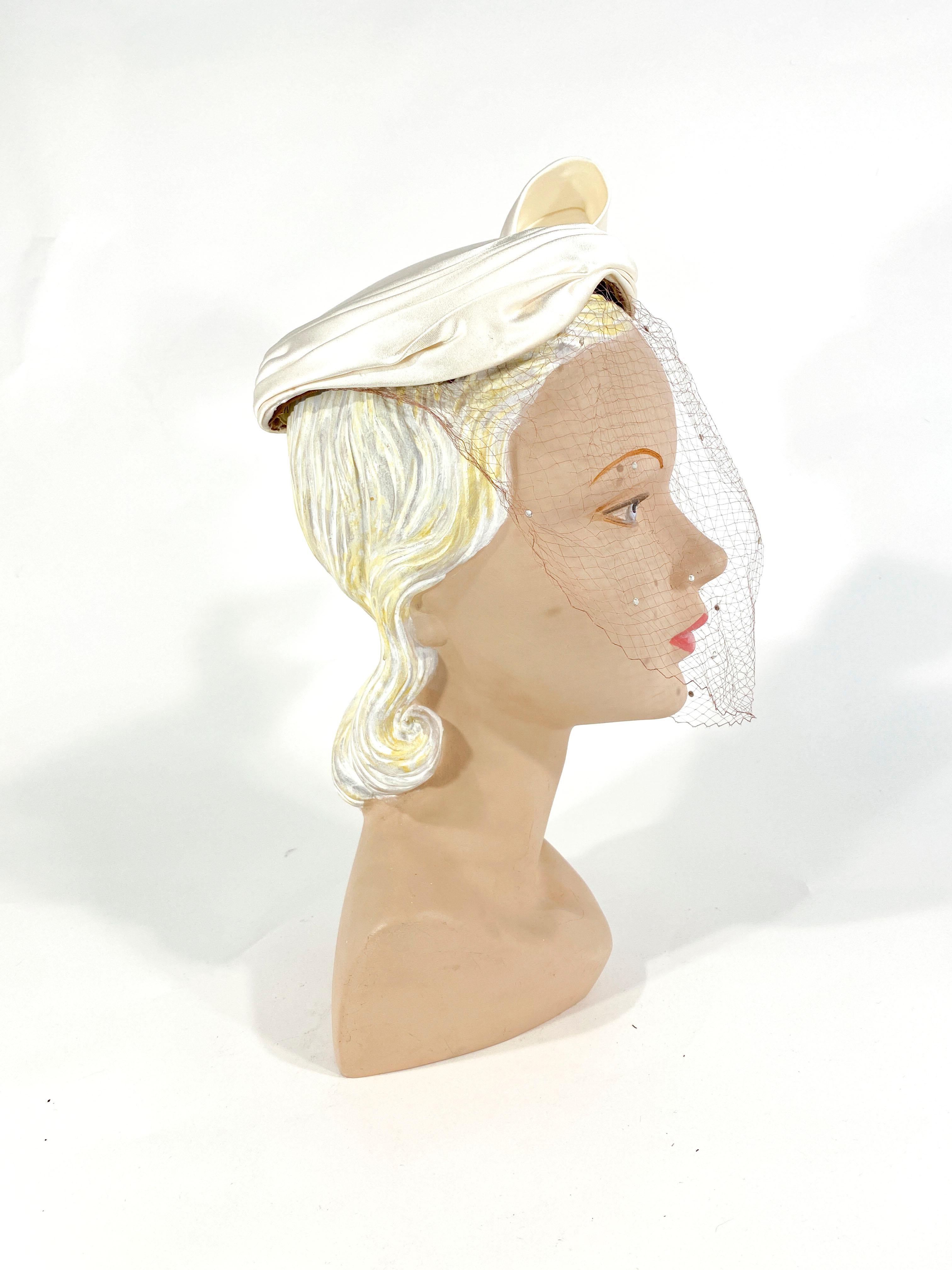 Women's 1950s White Satin Cocktail Hat with Sculpted Bow