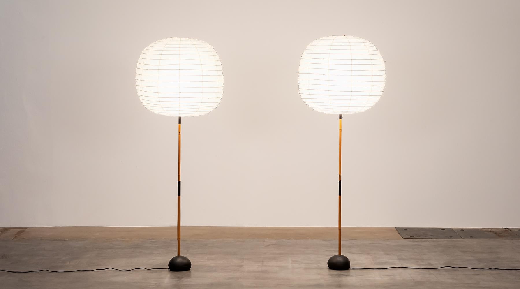 Sculptural light, pair of Floor Lamps by Isamu Noguchi, USA, 1952.

Beautiful Floor Lamps by Isamu Noguchi. The shade is made out of fine paper followed by a bamboo stem ends on a iron base. The lamps promises a very warm, pleasant light.