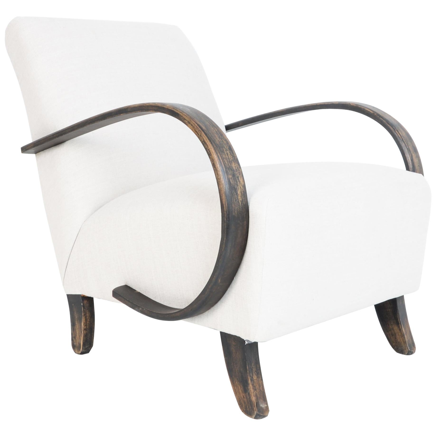 white upholstered armchair