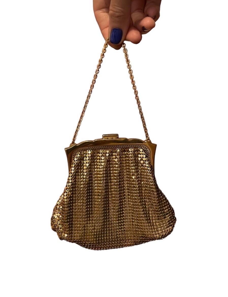 Vintage 1950’s Whiting & Davis Gold Chainmail Mesh Mini Evening Purse with Unique Clasp & Small Chain Strap. A Show Stopping Piece of the Time Period. Gorgeous Fun Bag in Perfect Condition! No Holes or Tears in Satin Peach Liner, Hand stitched to