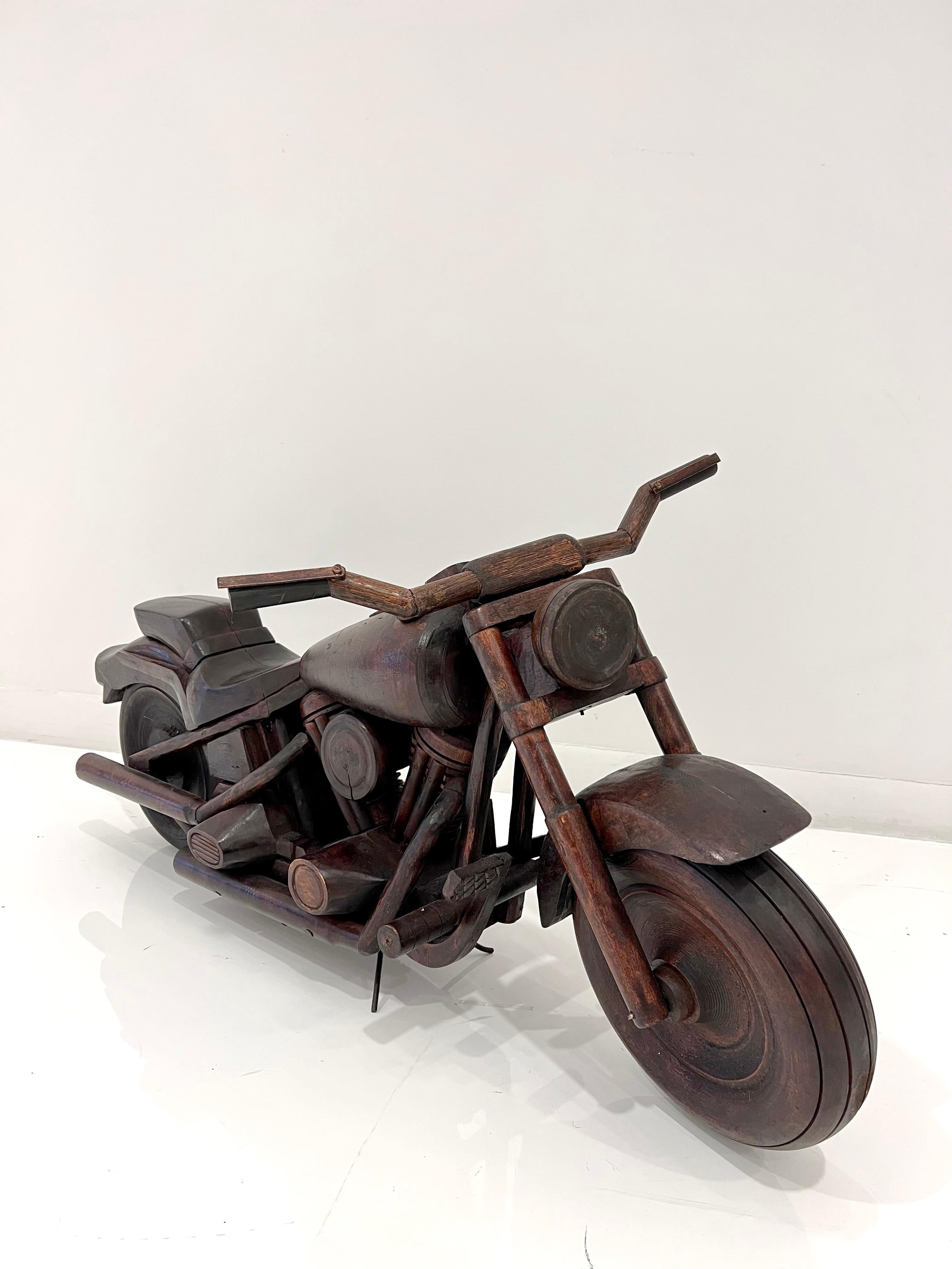 Unique motorcycle model with moving parts, fully constructed in wood. New Hampshire, circa 1950's.