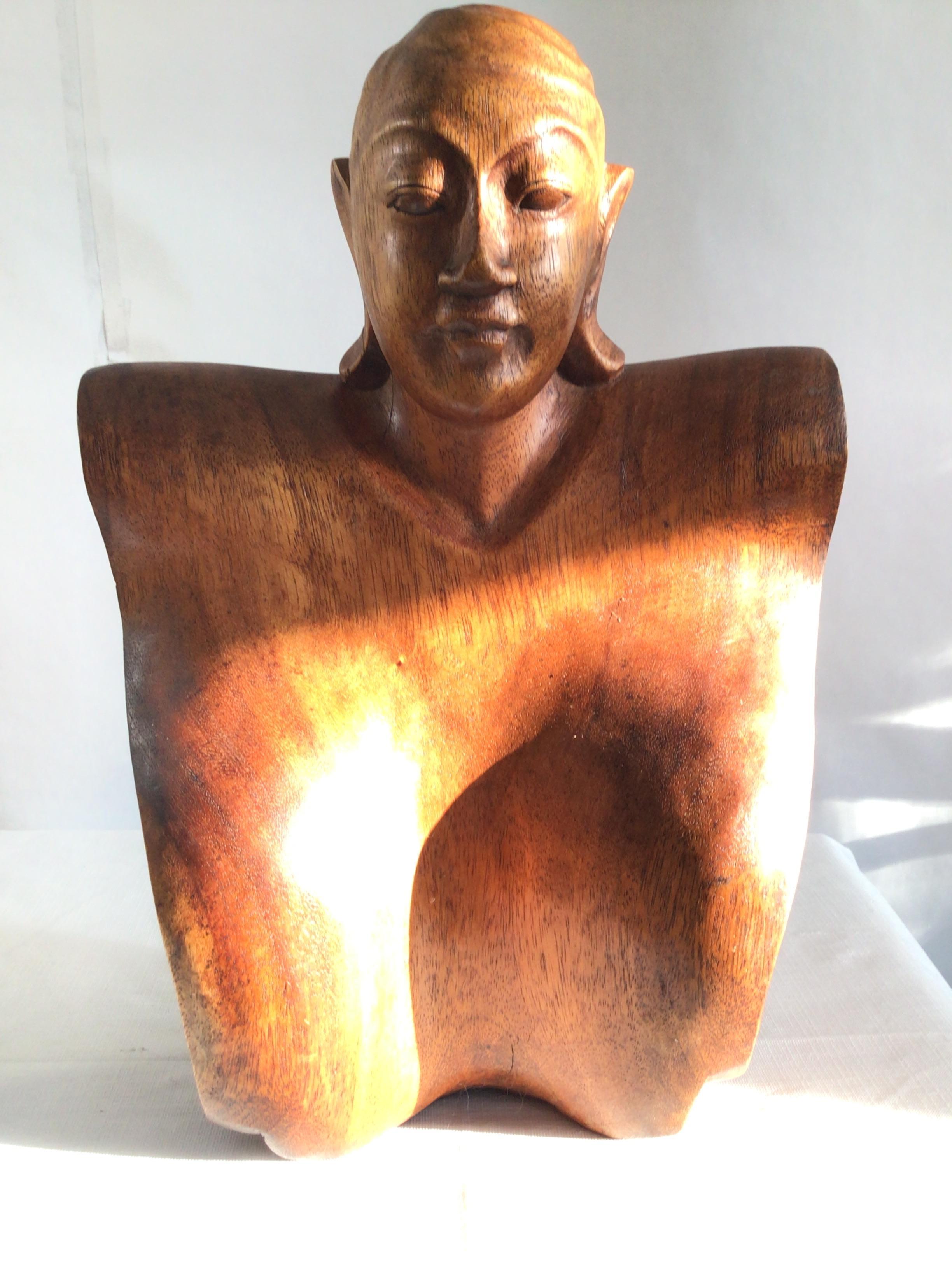 A beautiful 1950s Wood Sculptural Bust of a Woman
Sides appear as a scroll 
Richly Carved Wood
Crack in wood on left side.