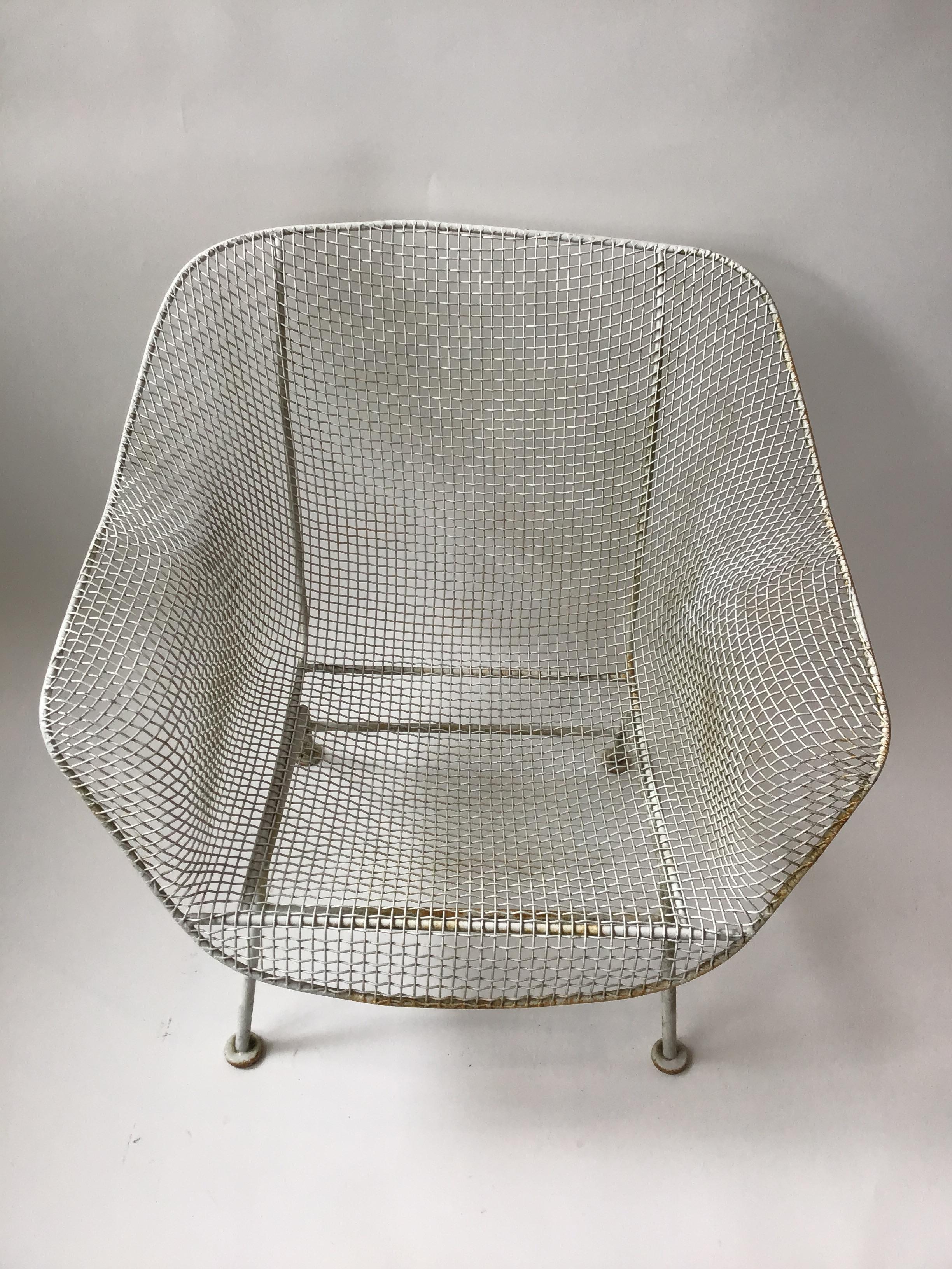 1950s woodard sculptura iron mesh lounge chair. Out of a Southampton, N.Y. Estate.