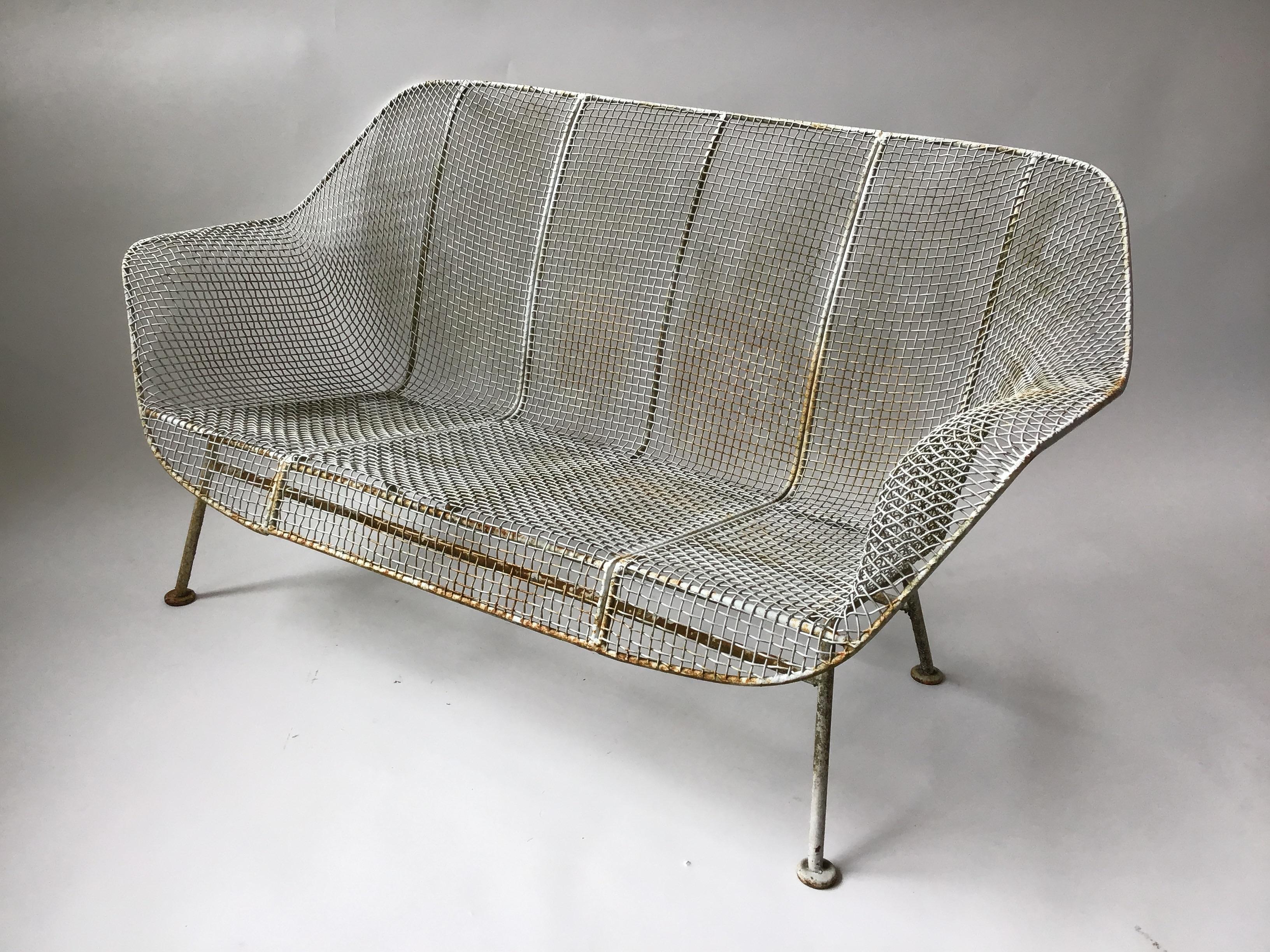 1950s Woodard sculptura iron mesh settee. Needs painting. Out of a Southampton, N.Y. Estate.