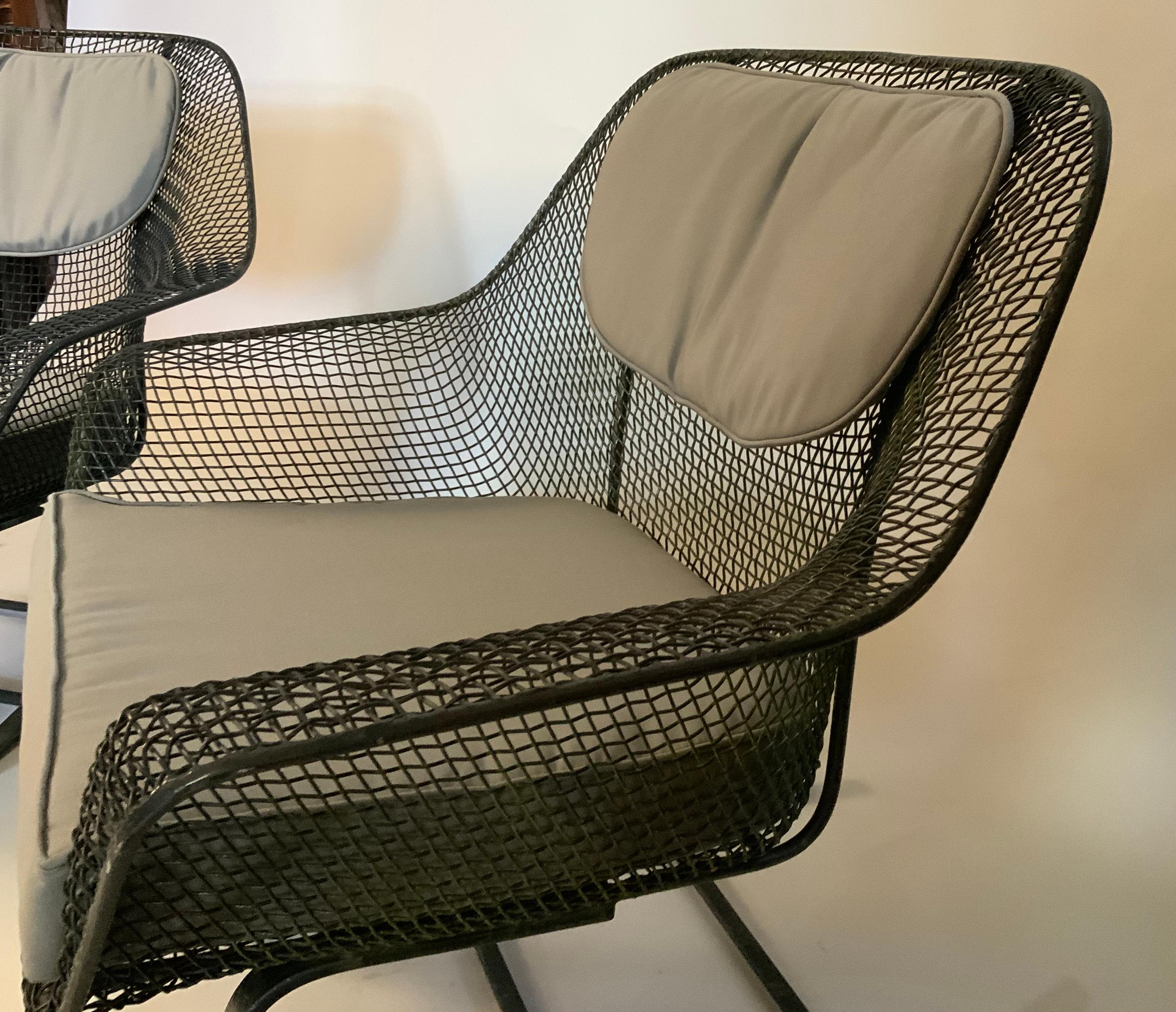 A 1950s wrought iron and steel mesh settee and large lounge chair from Russell Woodard's iconic Sculptura series. Beautiful and Classic sculptural design, finished in black, but can be finished in any color you choose. Cushions not included but can