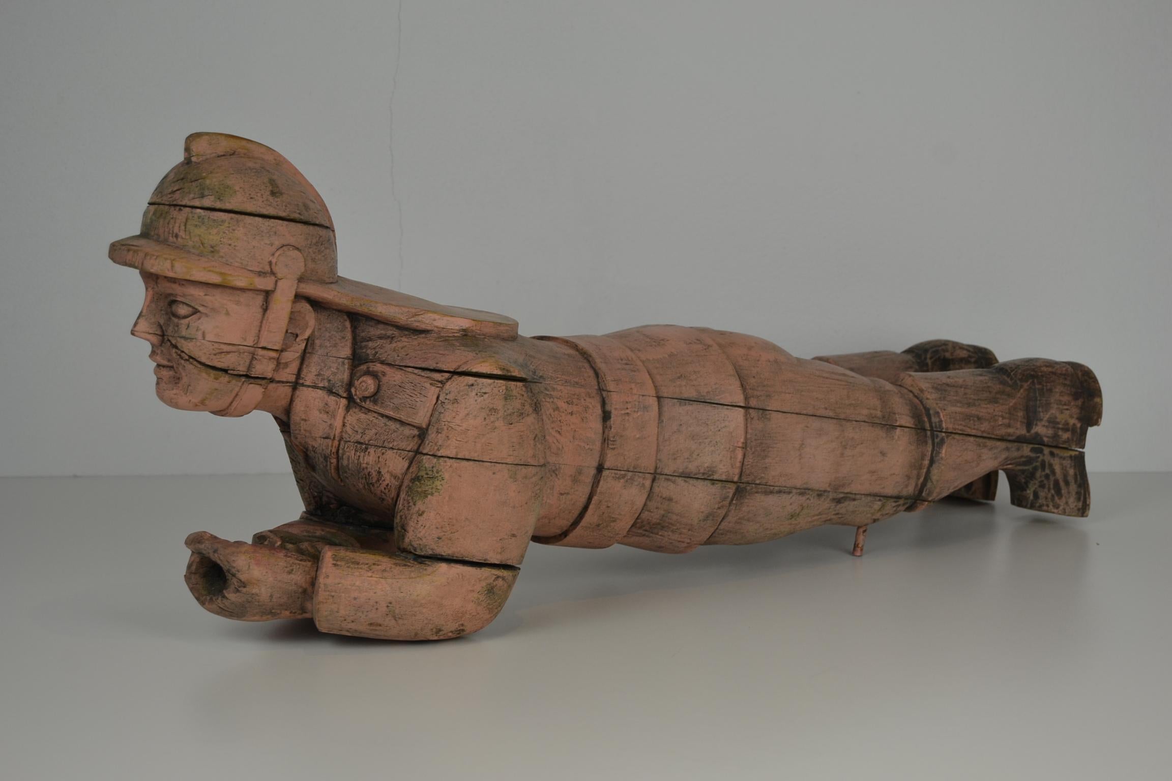 Original 1950s Hand-Carved wooden Fire Man Sculpture for Carousel or Merry-go-Round, 
made for Wilhelm Hennecke. This wooden sculpture of a Firefighter was used  on a carnival ride Fire Truck on the ladder. This Carousel Sculpture was made for the