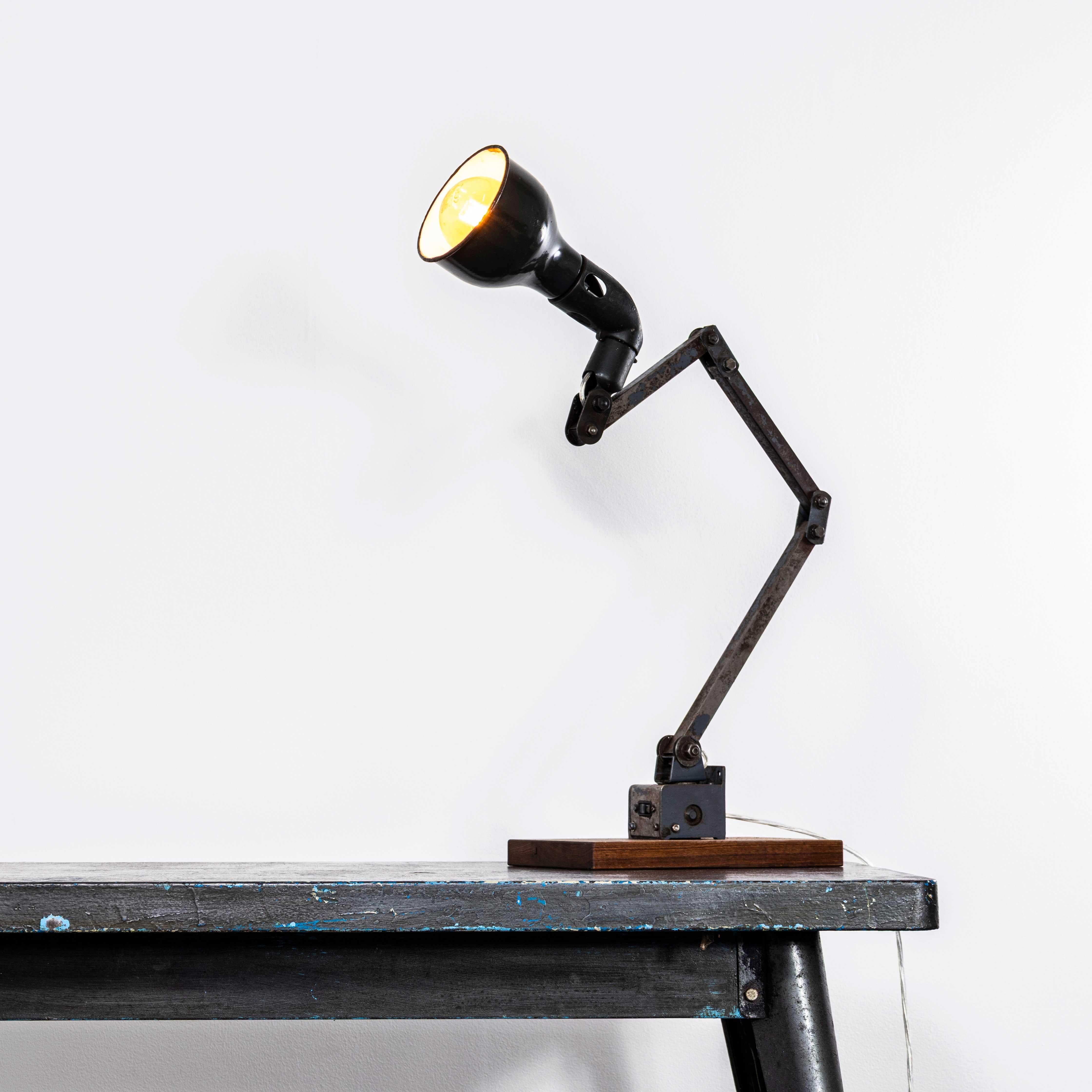 1950’s Workshop Task Lamp By Mek Elek. 
The lamp was produced by MEK ELEK, the company was founded in Mitcham Surrey in 1931 by H.C. Cooper, their key product was the Mek Elite or Mekelite – a light specifically designed for use in factories with