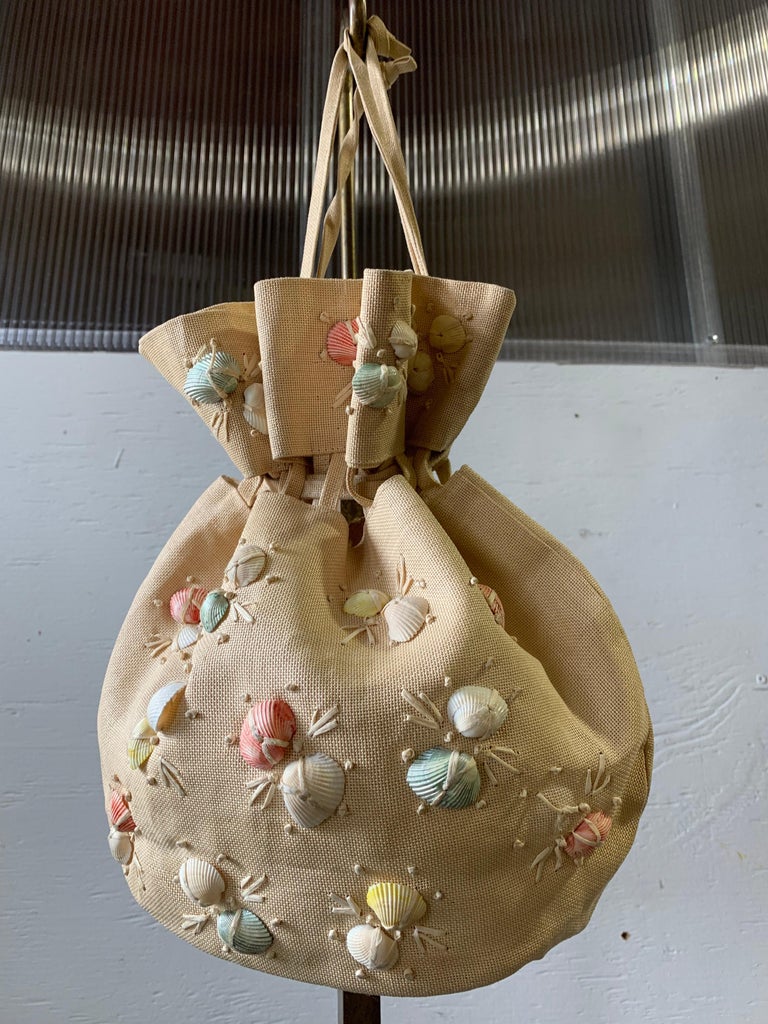 Borsa a sacchetto con coulisse in paglia Panama intrecciata degli