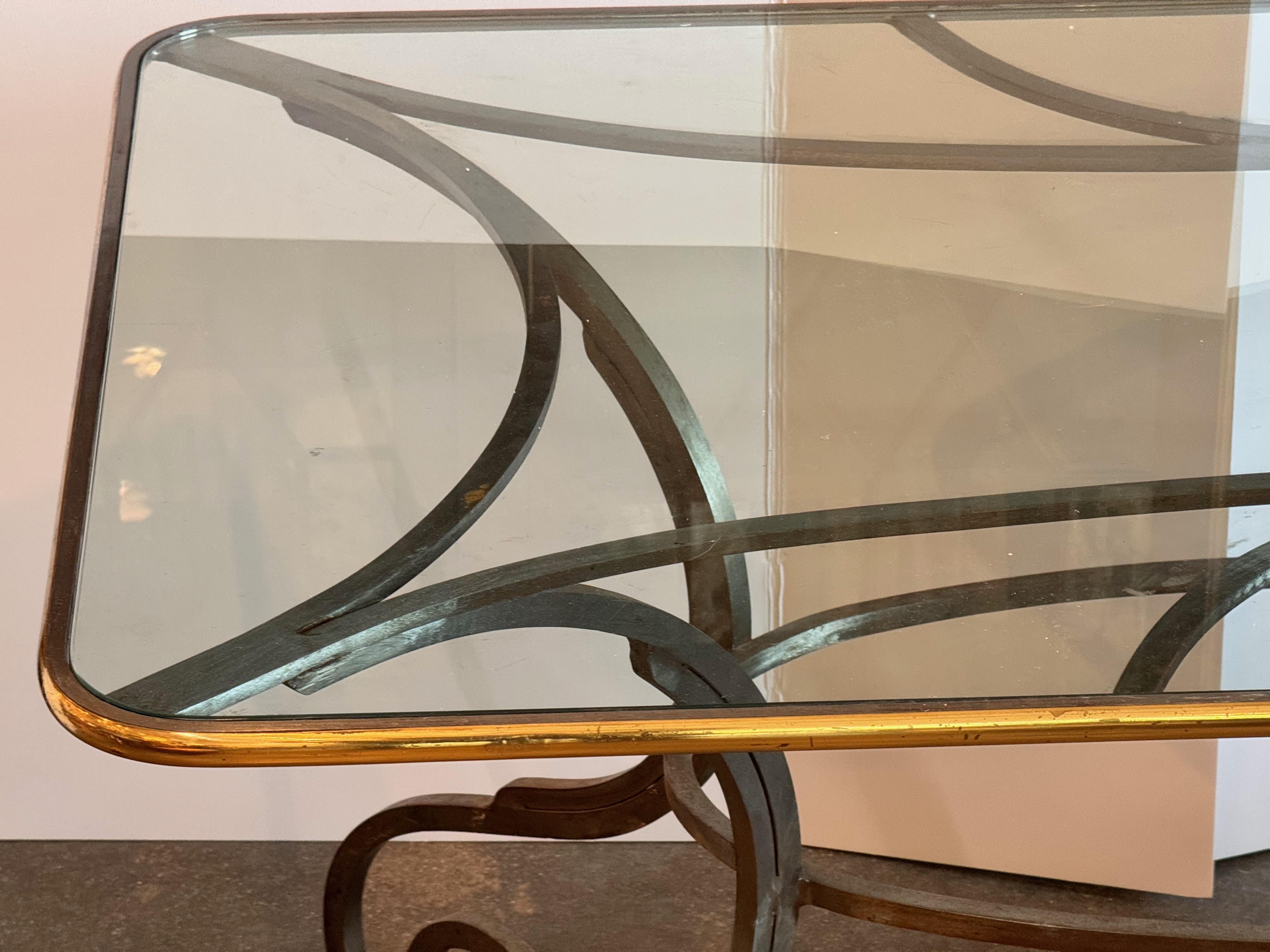 Metà XX secolo 1950s Wrought Iron and Glass Scroll-Base Table in vendita