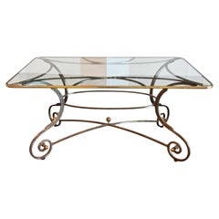 1950s Wrought Iron and Glass Scroll-Base Table