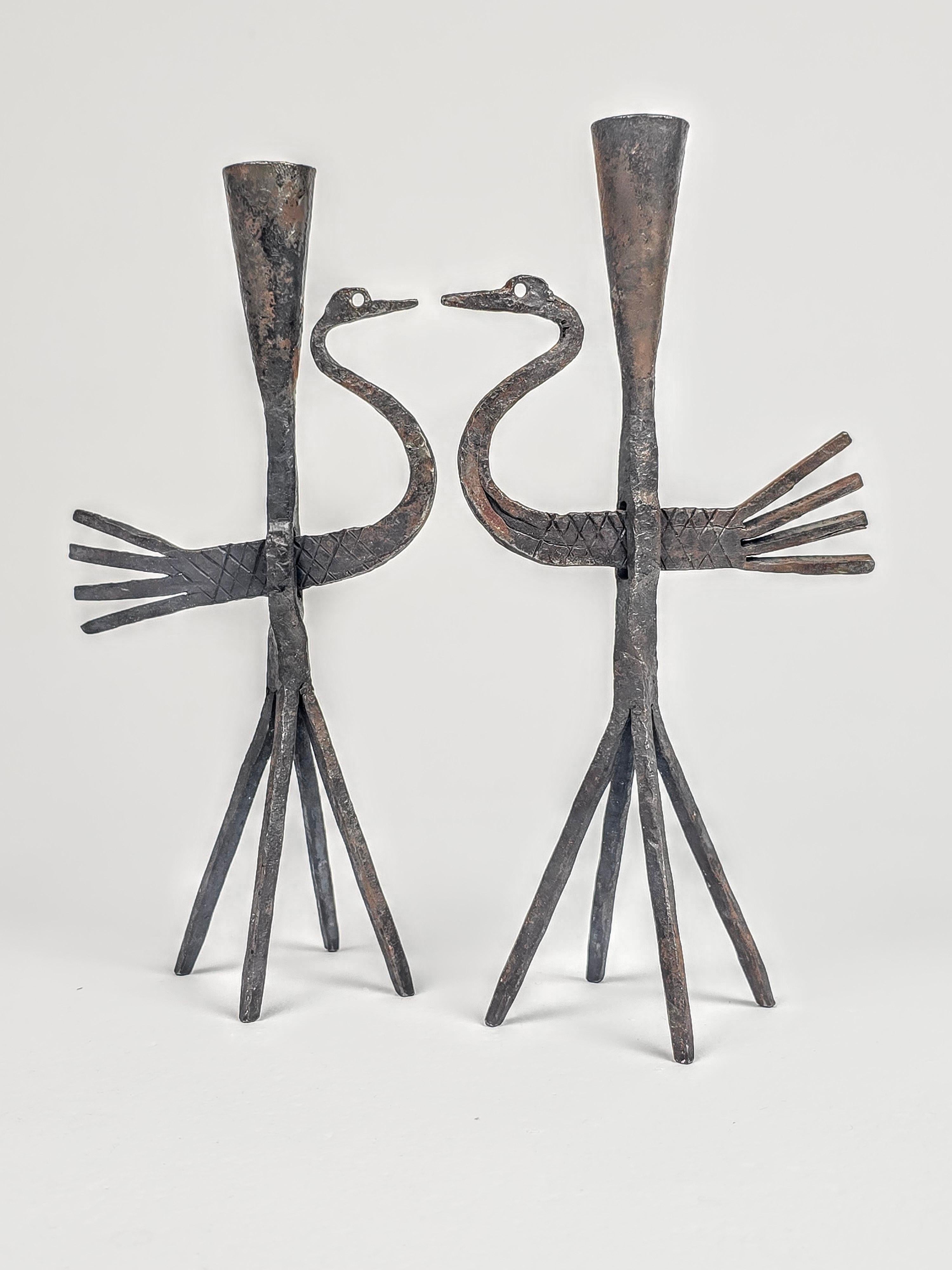 Pair of hand hammered wrought iron bird candelstick from Jean Touret for Les Ateliers Marolles , France 1950s . 

Measure 10 in. high by 5 in. wide by 3.5 in. deep. 