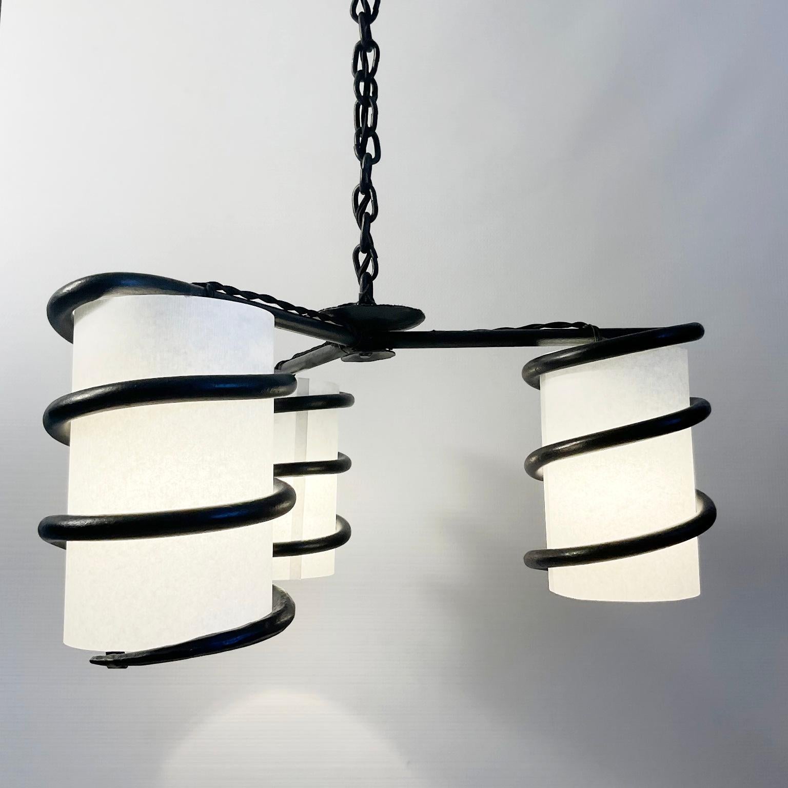 1950s Wrought Iron Chandelier Attributed to Jean Touret and the Atelier Marolles In Good Condition In London, GB