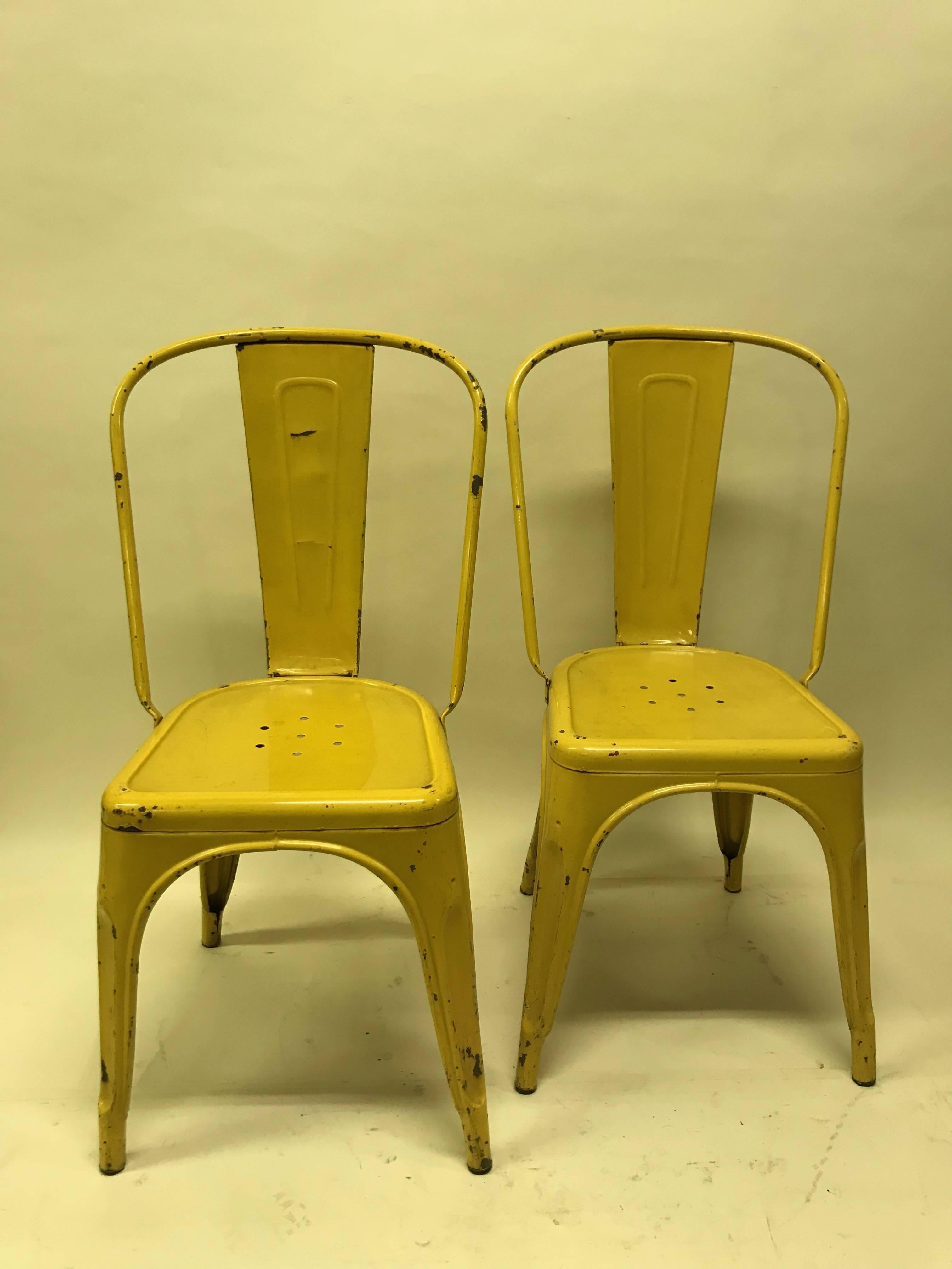 Pair of French bistrot chairs designed by Xavier Pauchard for Tolix. Those chairs presents the very nice yellow color.

Collector’s note:

The Model A chair has become an icon of industrial aesthetics. It’s unfailing popularity since 1934 has