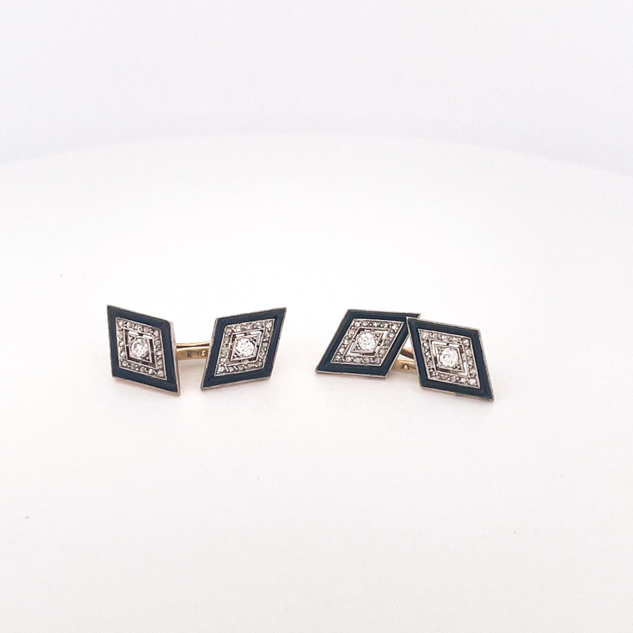 From the Eiseman Estate Jewelry Collection, circa 1950s, 14 karat yellow gold black jade and diamond cufflinks. These cufflinks are crafted with 64 rose cut diamonds with a total combined weight of 0.50 carats. These diamonds have LMN color and SI